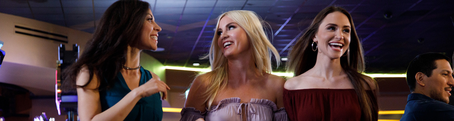 3 happy people in a casino