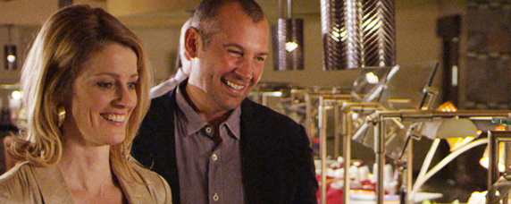 people getting food from the buffet