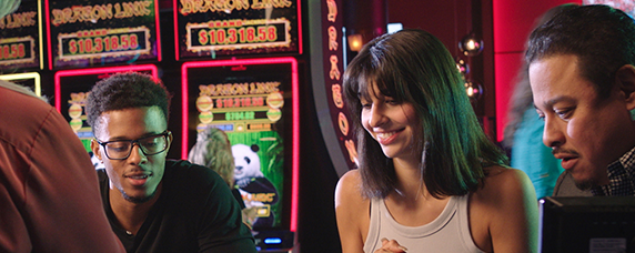 people playing at table games