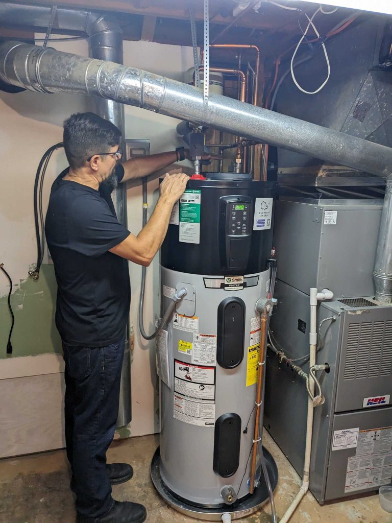 Elephant contractor installing heat pump water heater