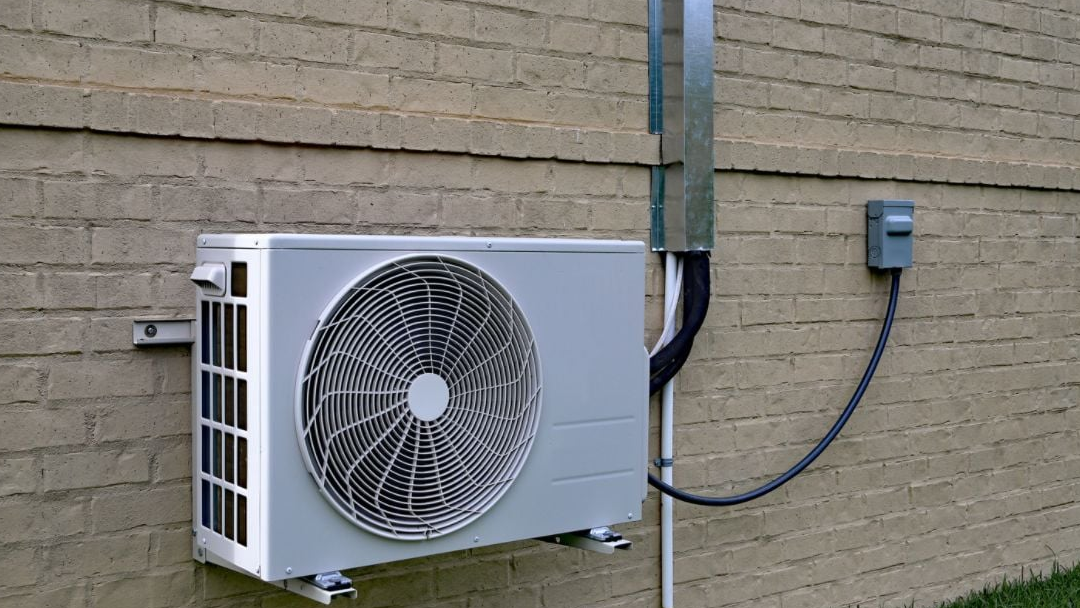 Heat pump outdoor compressor