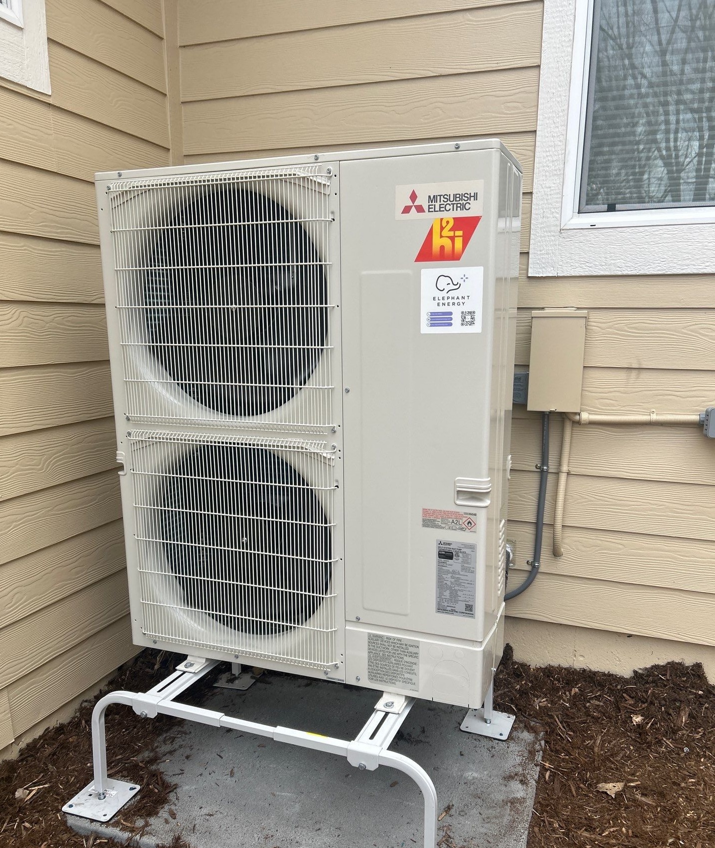 Heat pump in Colorado with Elephant sticker