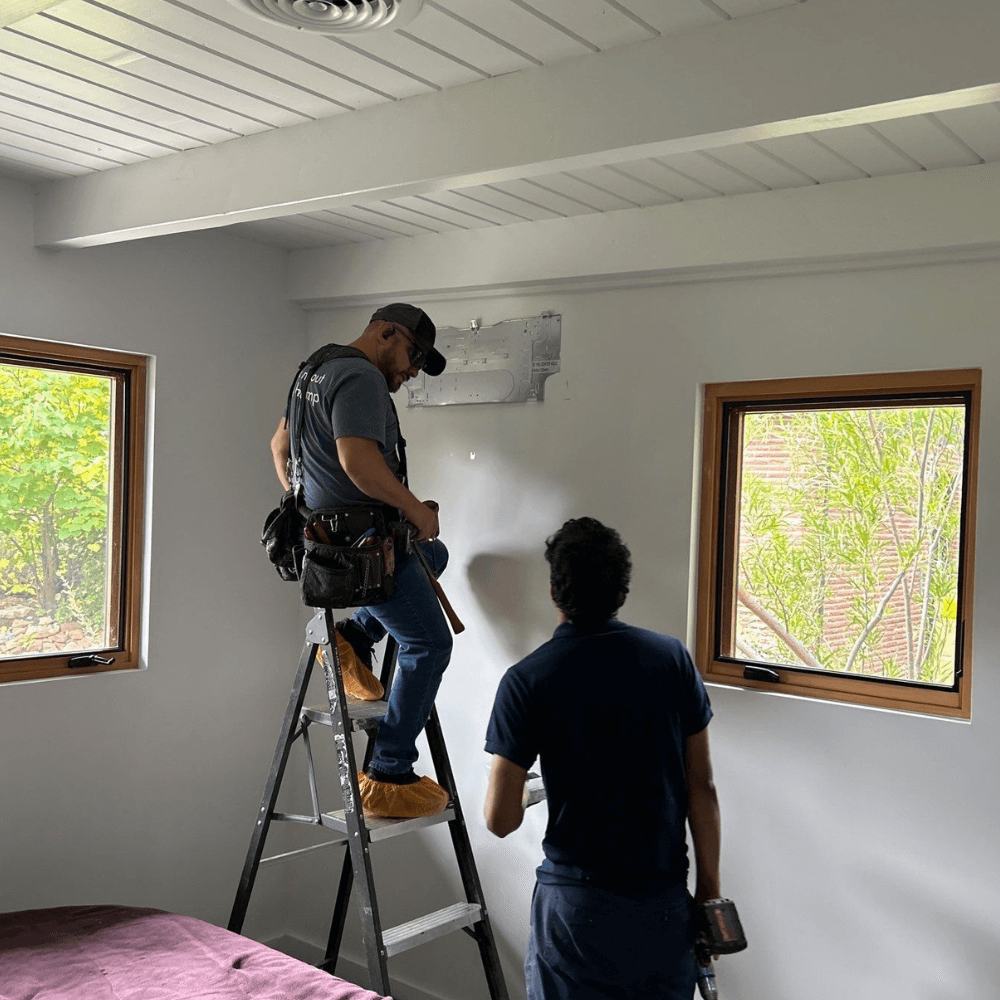 Elephant energy team installing mini split