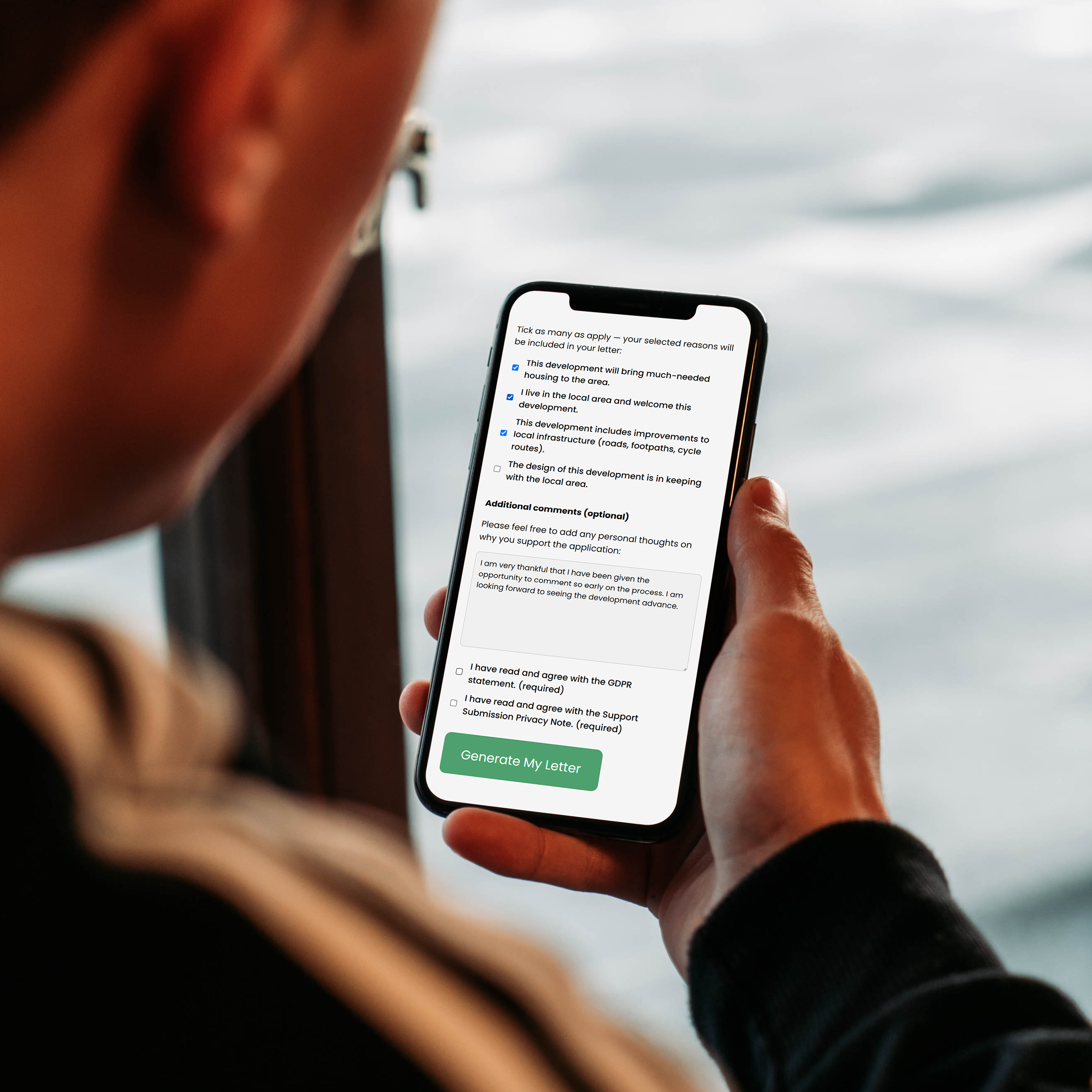 Man Holding i Phone Mockup