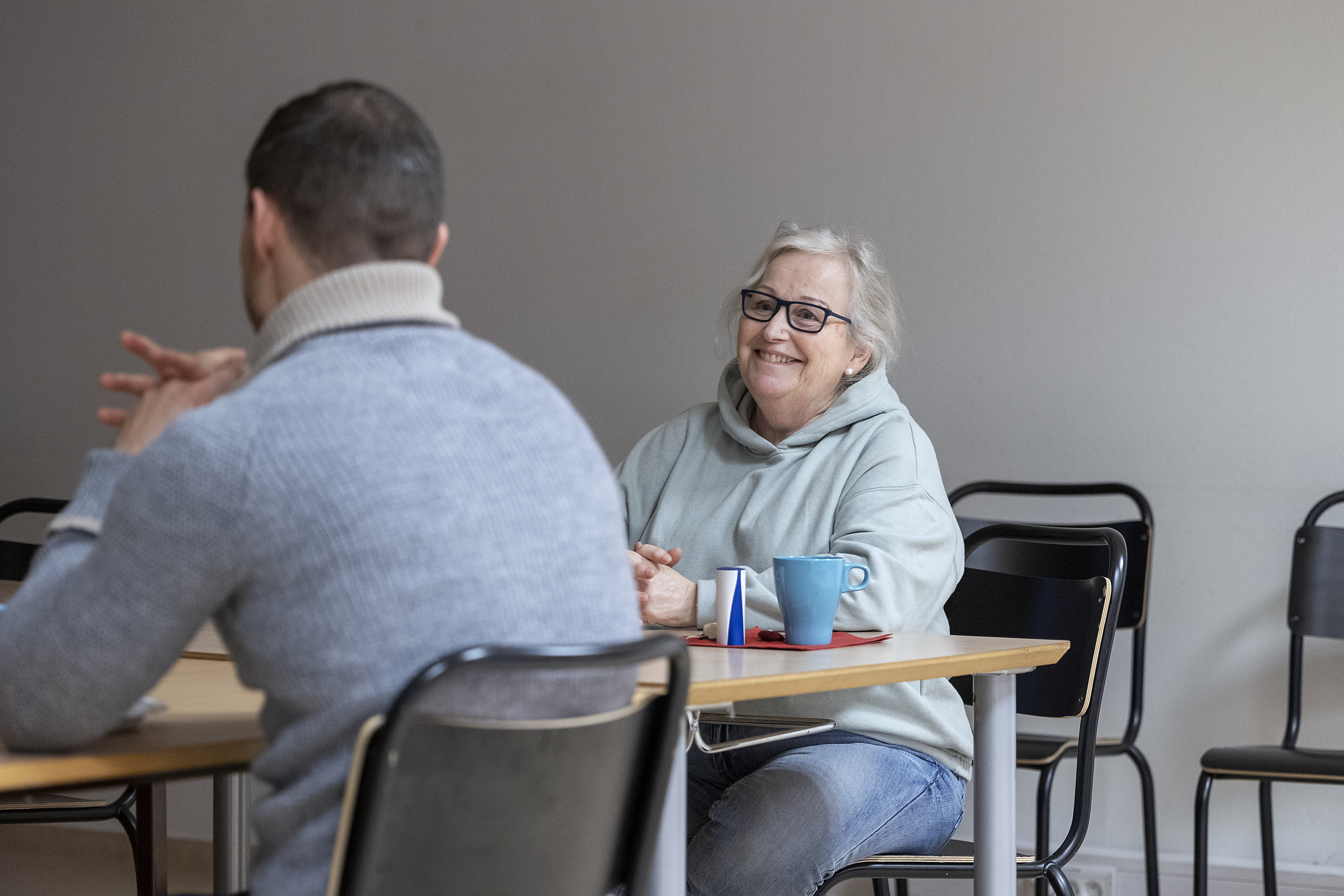 Deltaker i samtale med veileder