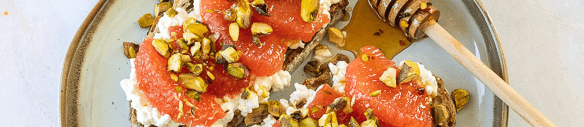 Sunkist® Grapefruit & Cottage Cheese Toasts with Pistachios & Hot Honey