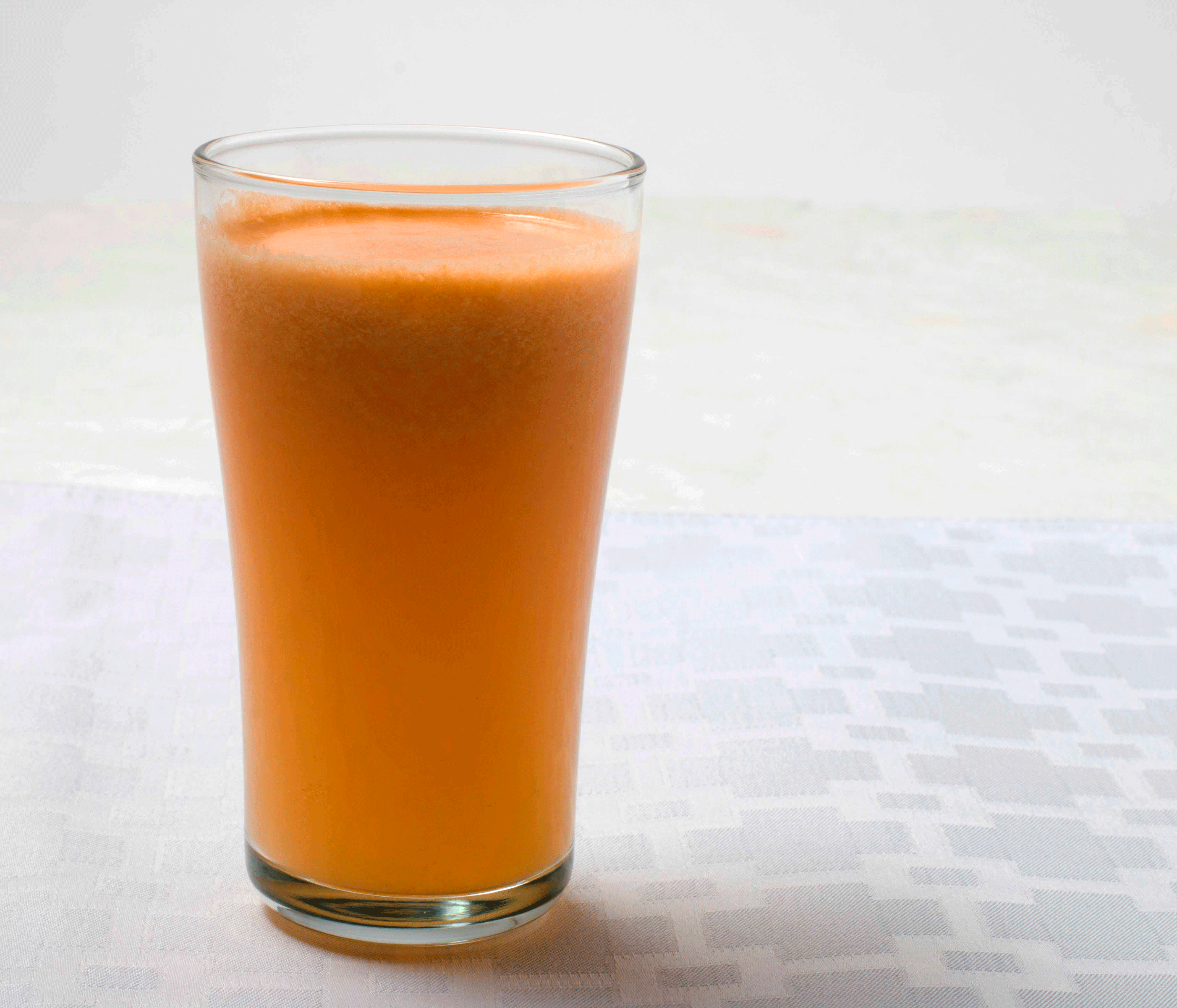 Minneola Tangelo, Pear, Ginger Juice