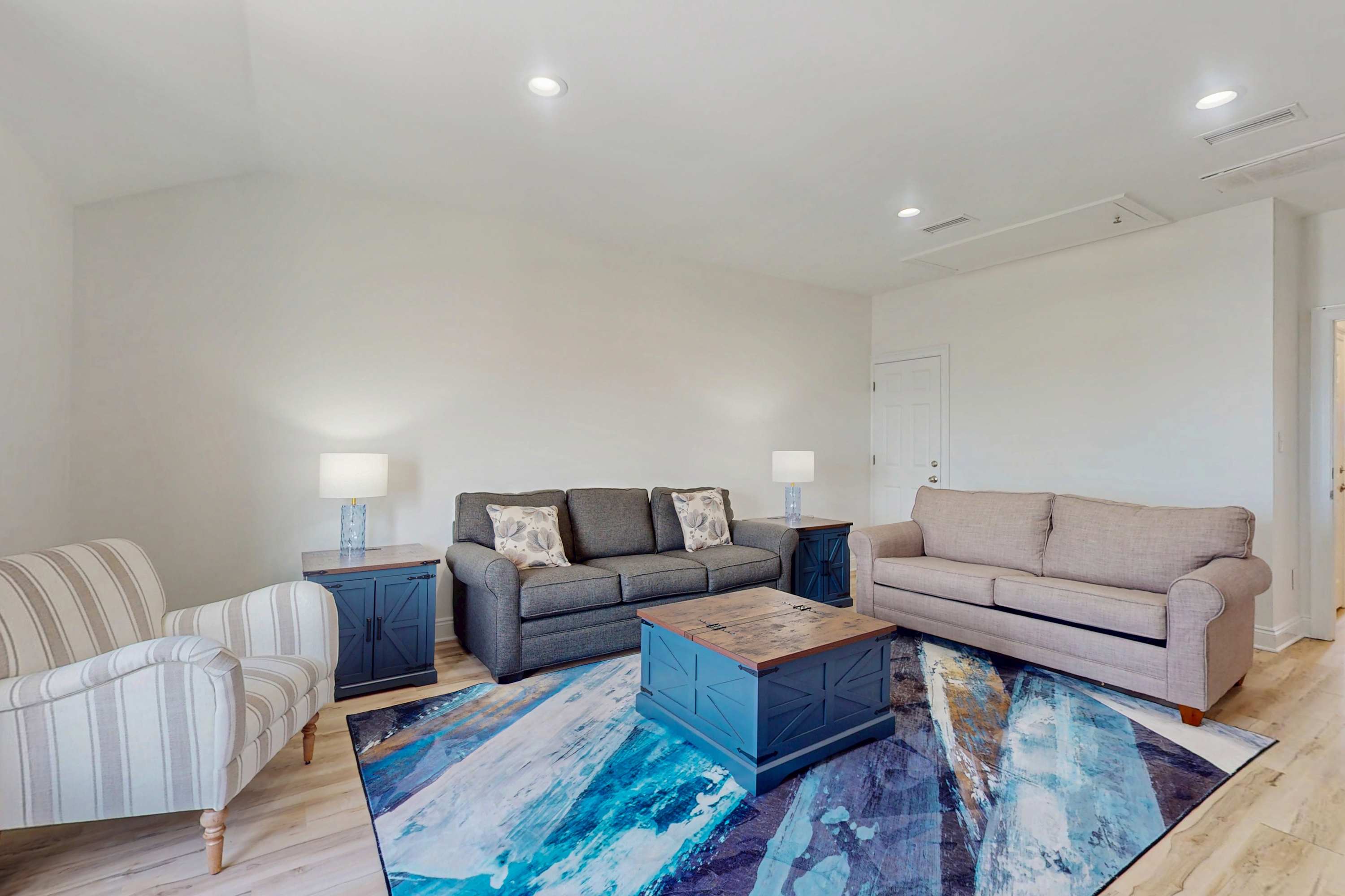 Spacious sitting room for primary suite upstairs
