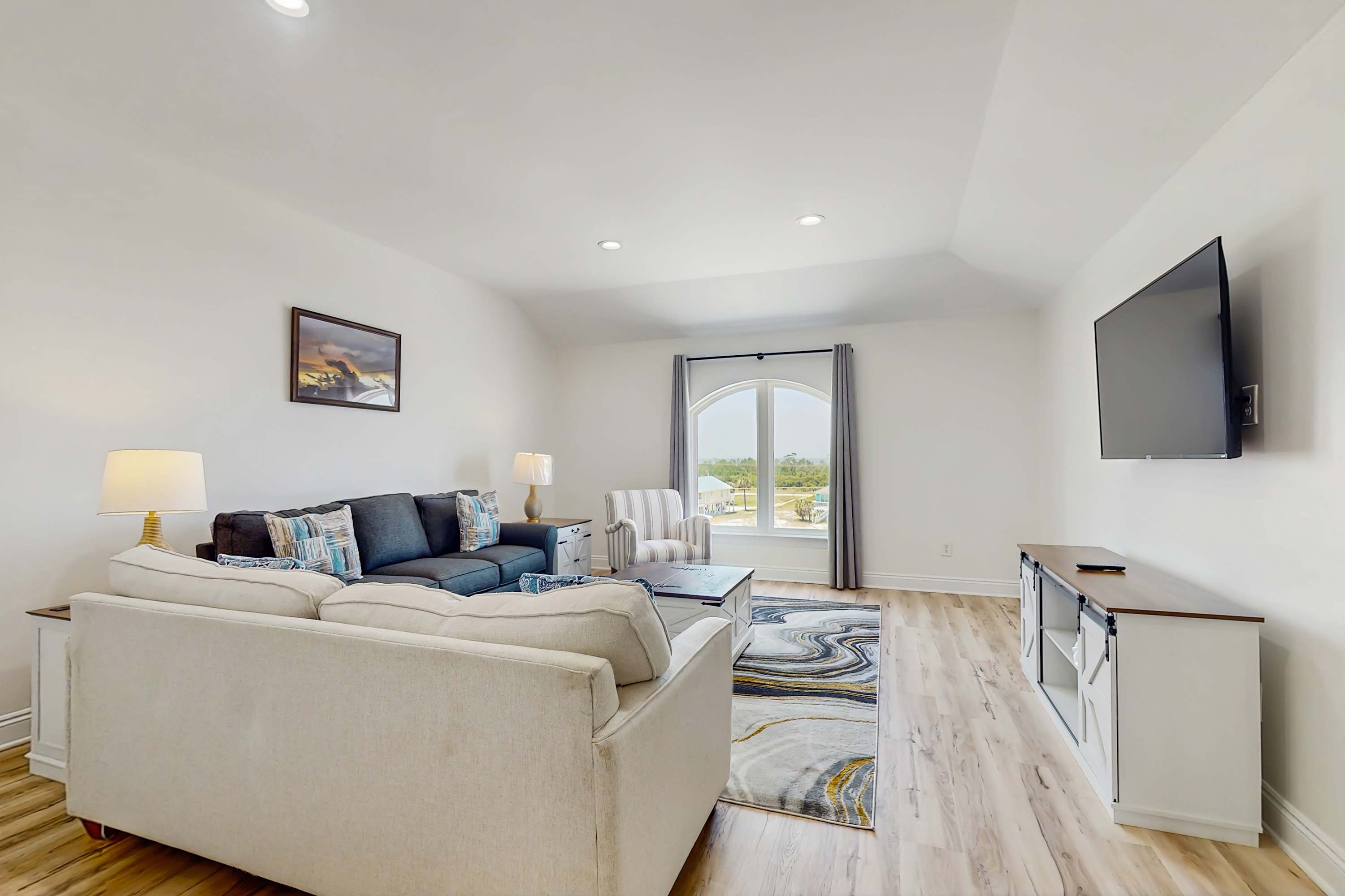 Spacious sitting room for primary suite upstairs