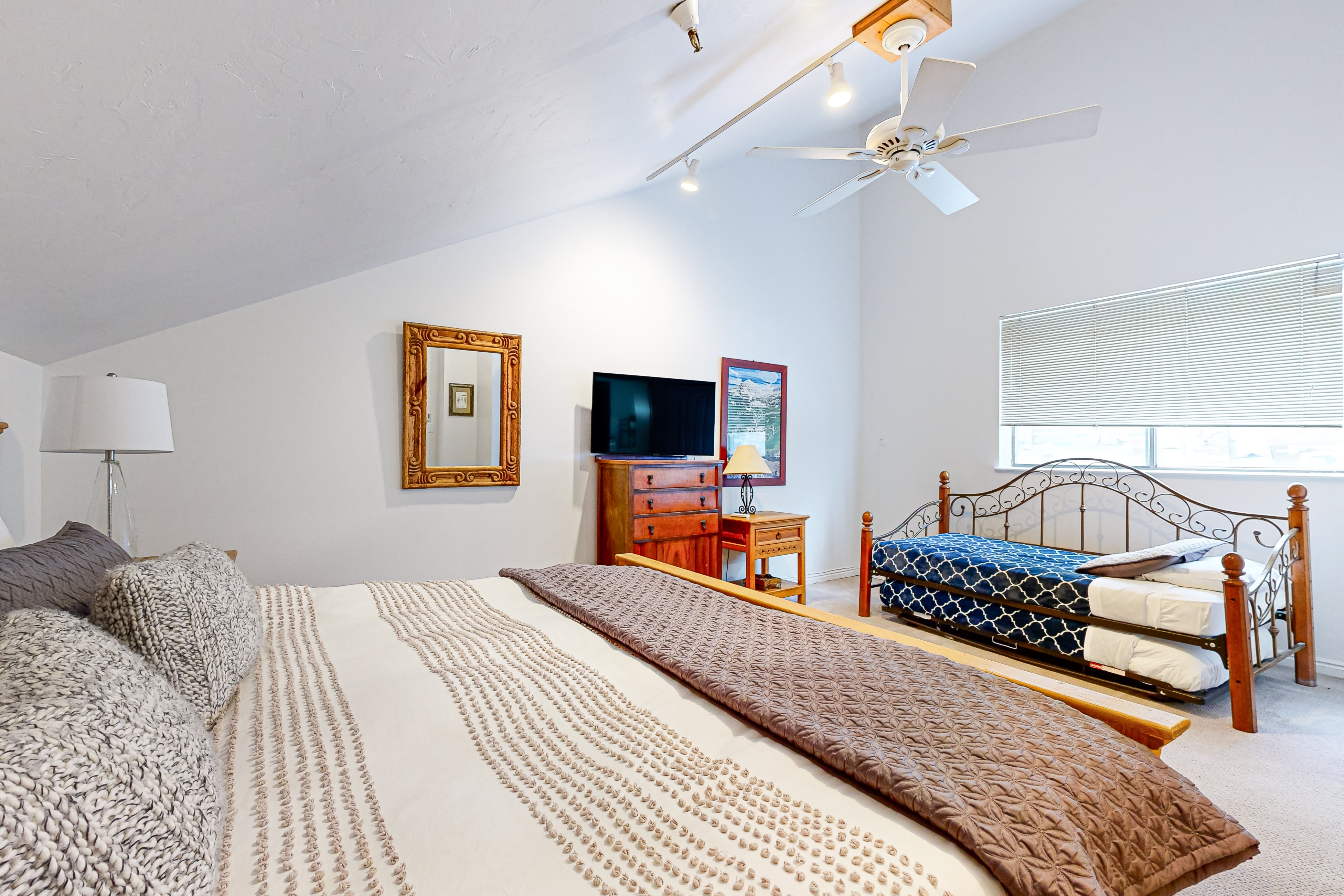 Where you will sleep- shared room with King bed, daybed and twin trundle.