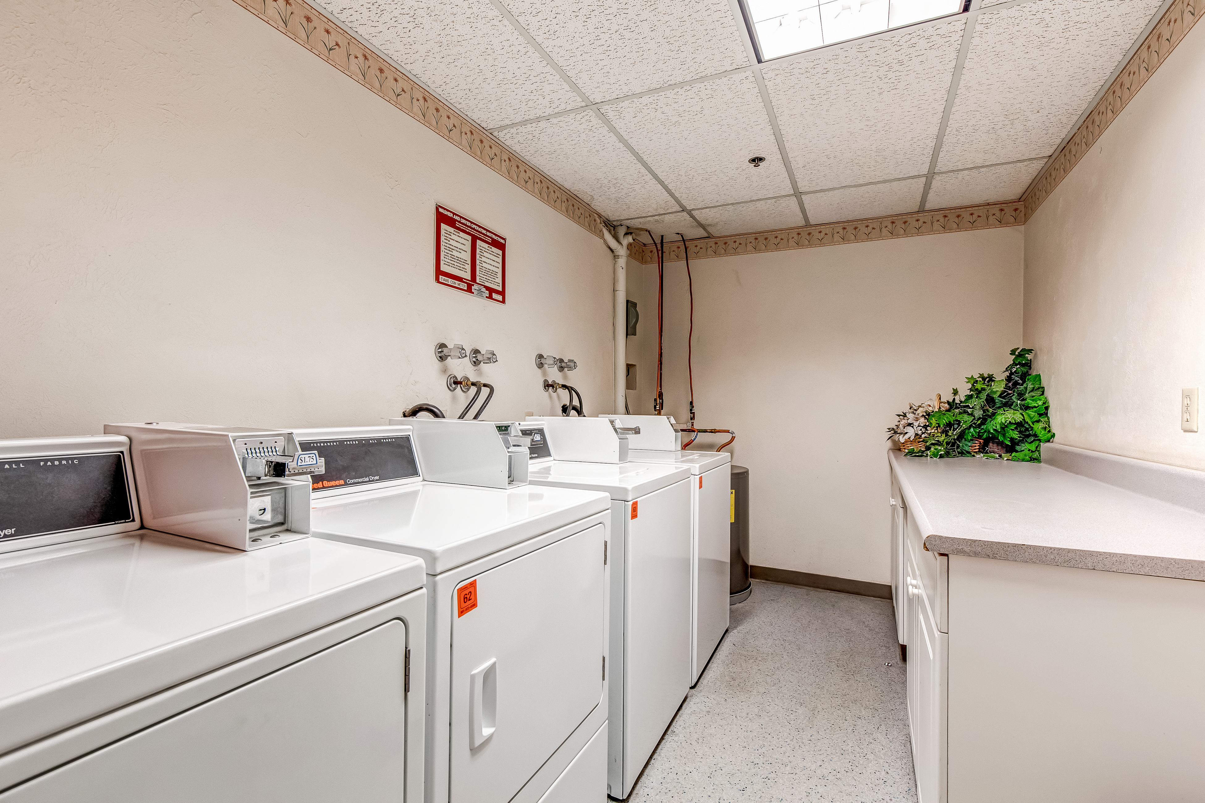 Coin operated laundry facility