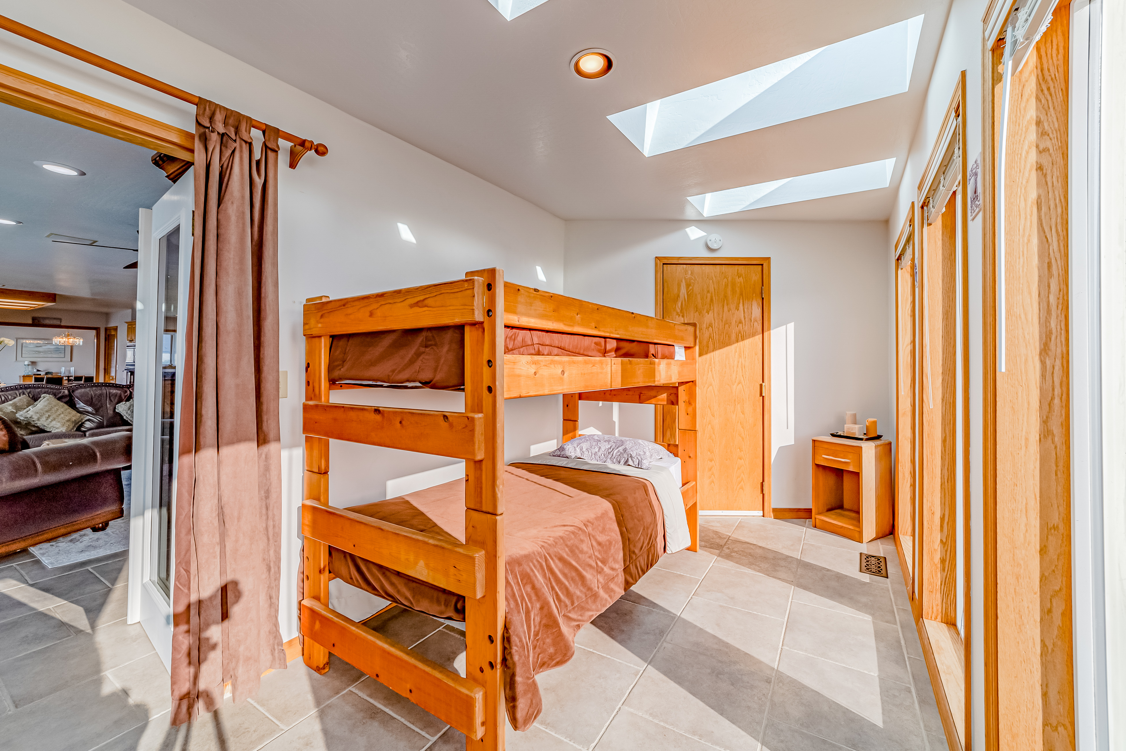 *warm sunroom bunkbeds, off living room - extra door too garage*