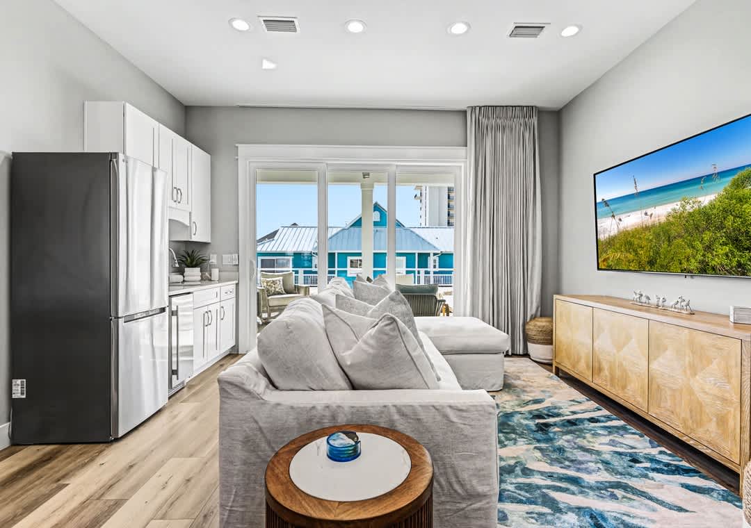 First floor living space with sleeper sofa and wet bar/kitchenette