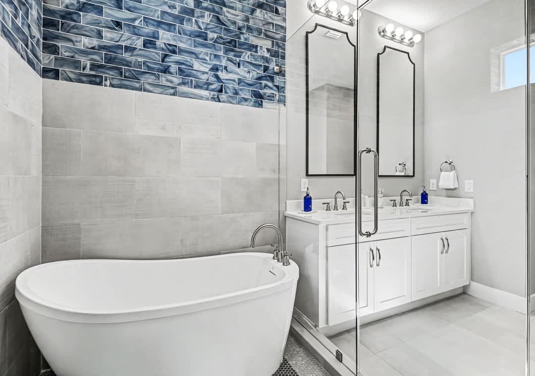 Primary ensuite bathroom 2 with a soaking tub