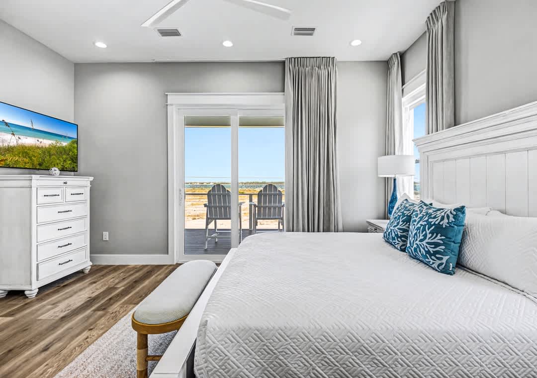 First floor guest bedroom 1 with private balcony