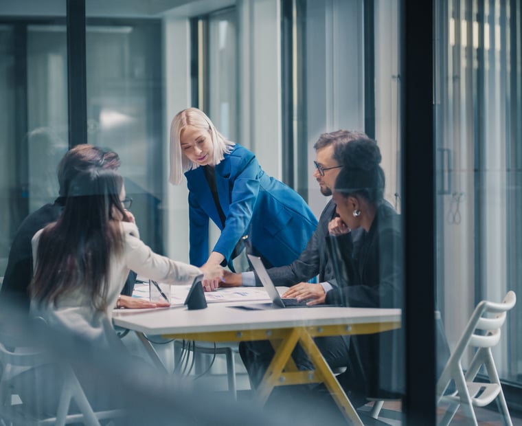 Group discussing data, BI, and analytics trends from BARC for 2025.