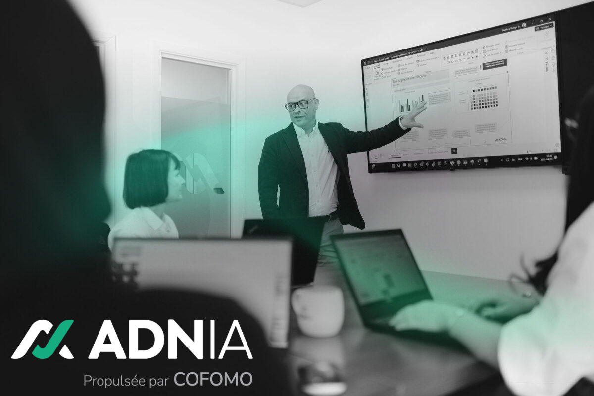 Image of an Adnia presentation powered by COFOMO at a client site.