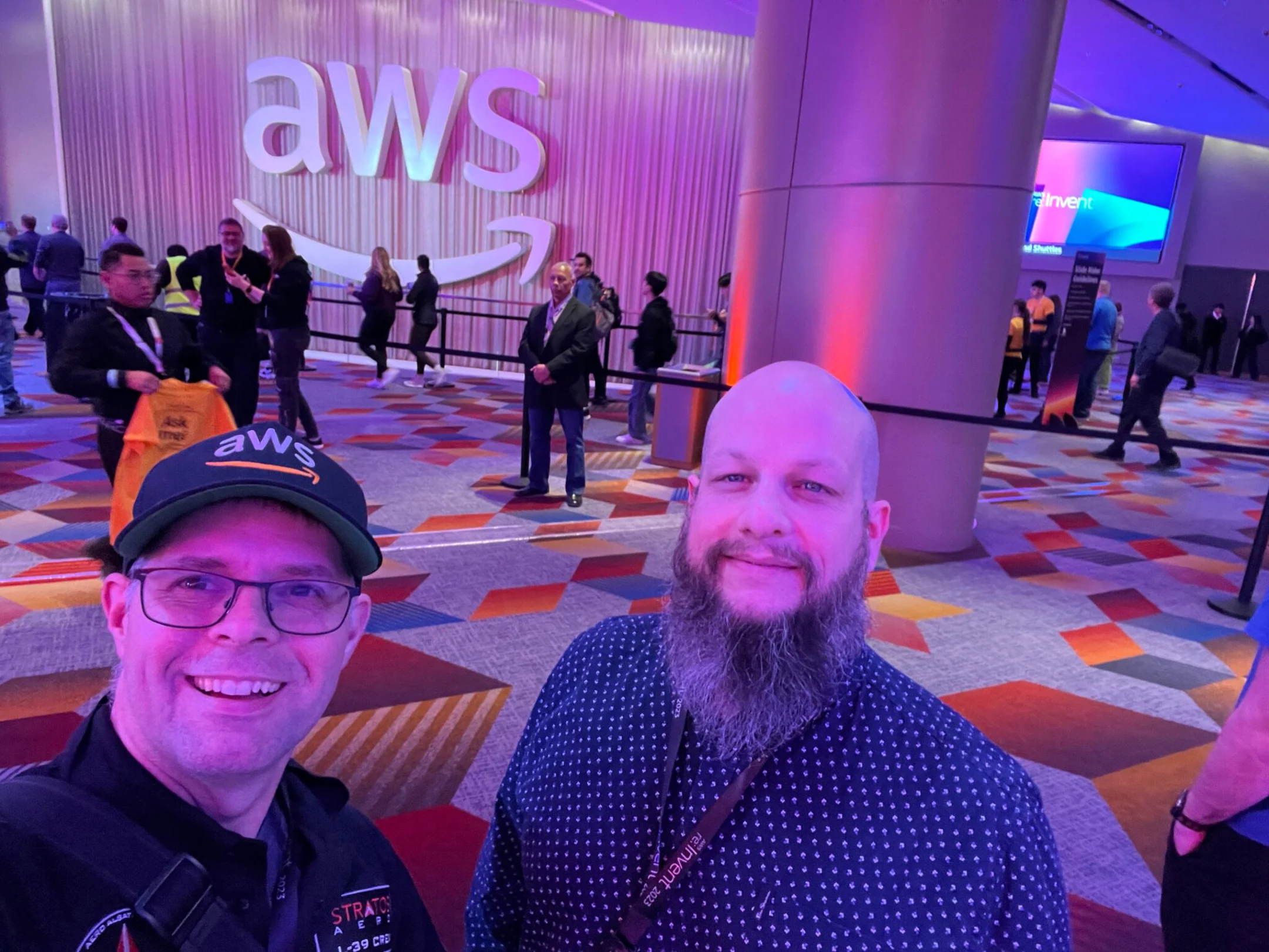 Photo of two of our experts at the AWS re:Invent 2023 conference.
