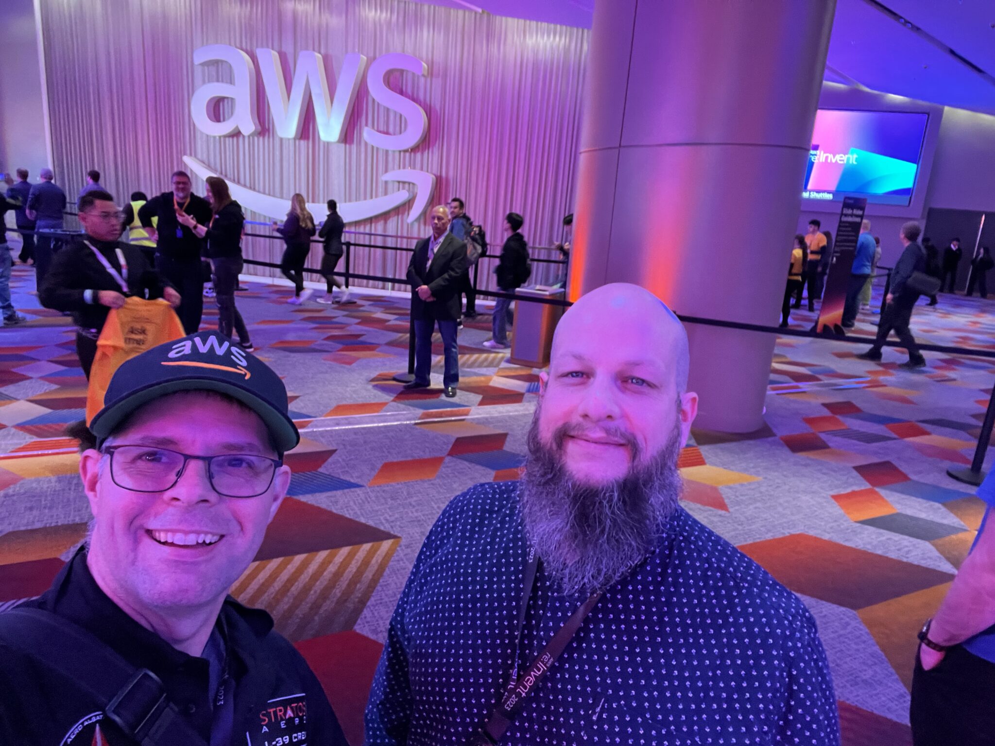 Photo of two of our experts at the AWS re:Invent 2023 conference.