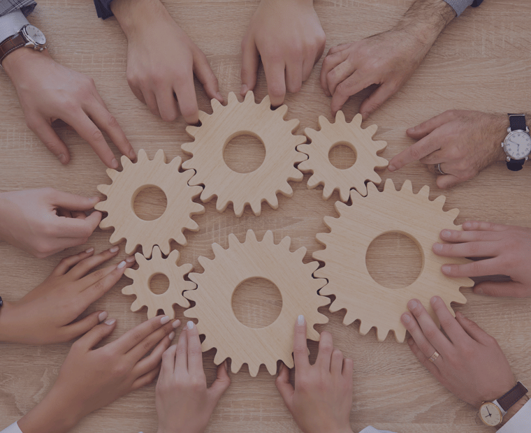 Illustration of multiple gears to convey why automating business processes with Microsoft Power Platform enhances operational efficiency.