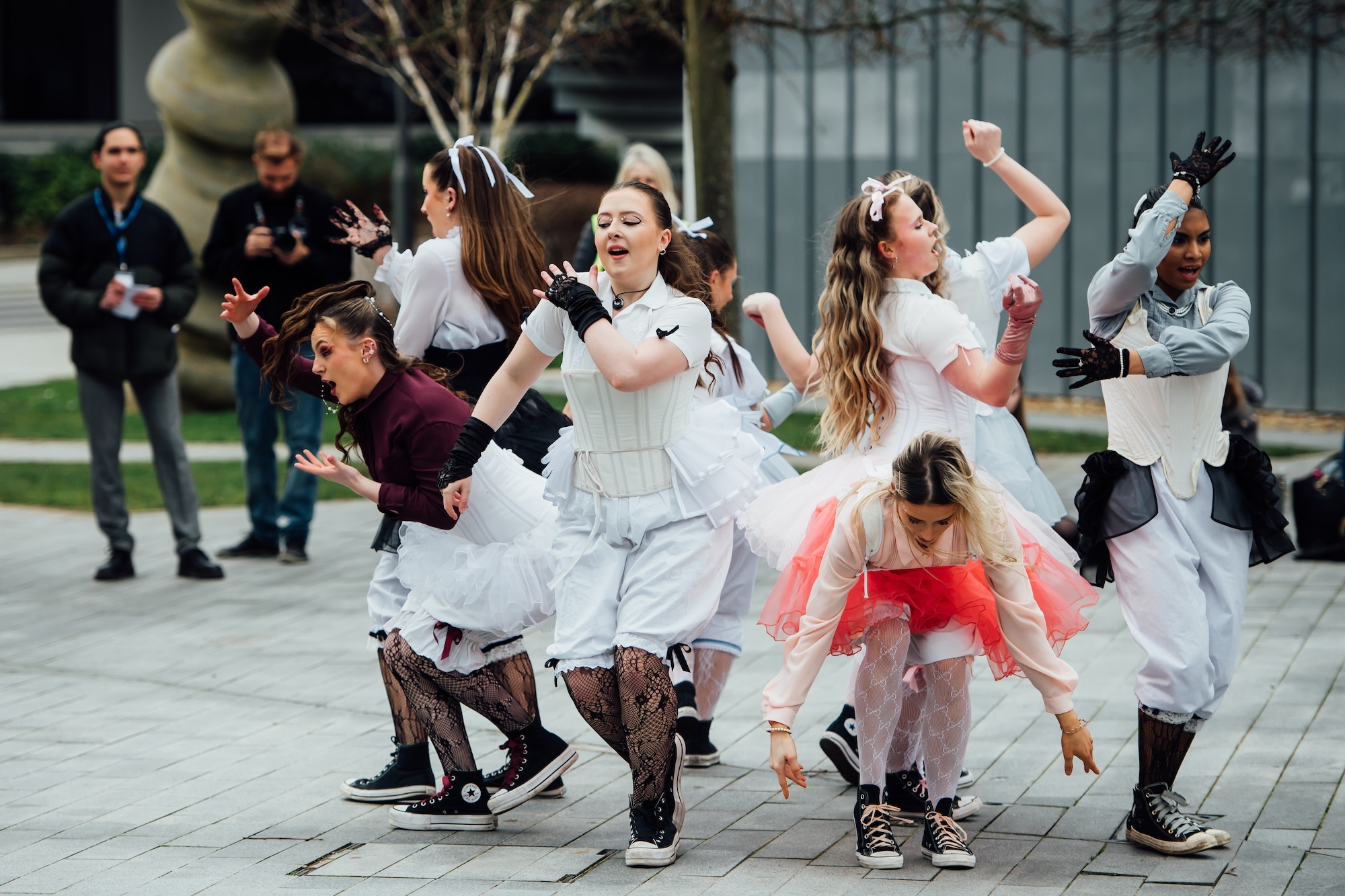 A group of BA (Hons) Dance students in costume performing at Day of Dance 2024 on AUB Campus.