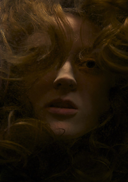 Photograph of a woman underwater