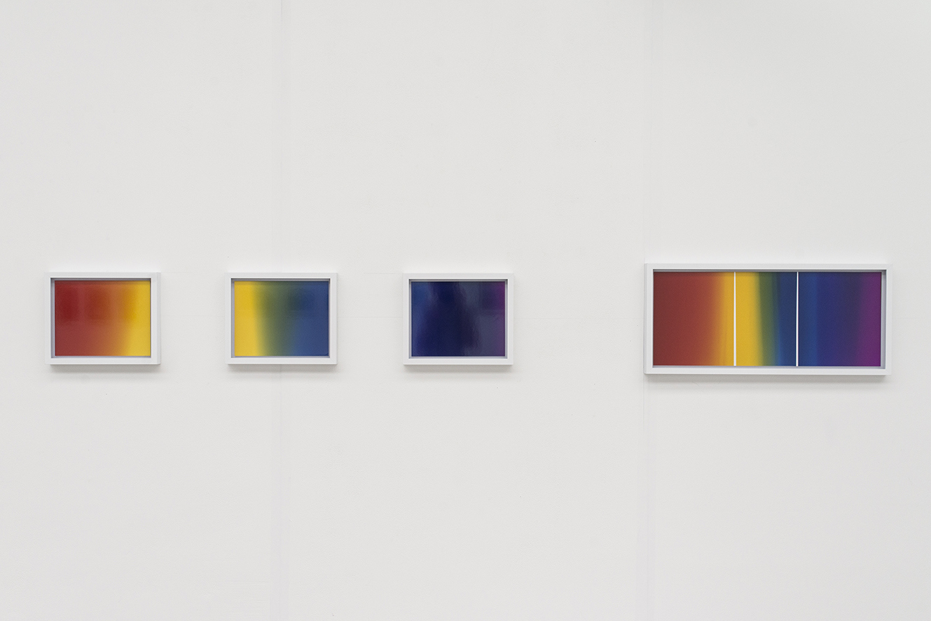 Five framed photos of rainbow gradient
