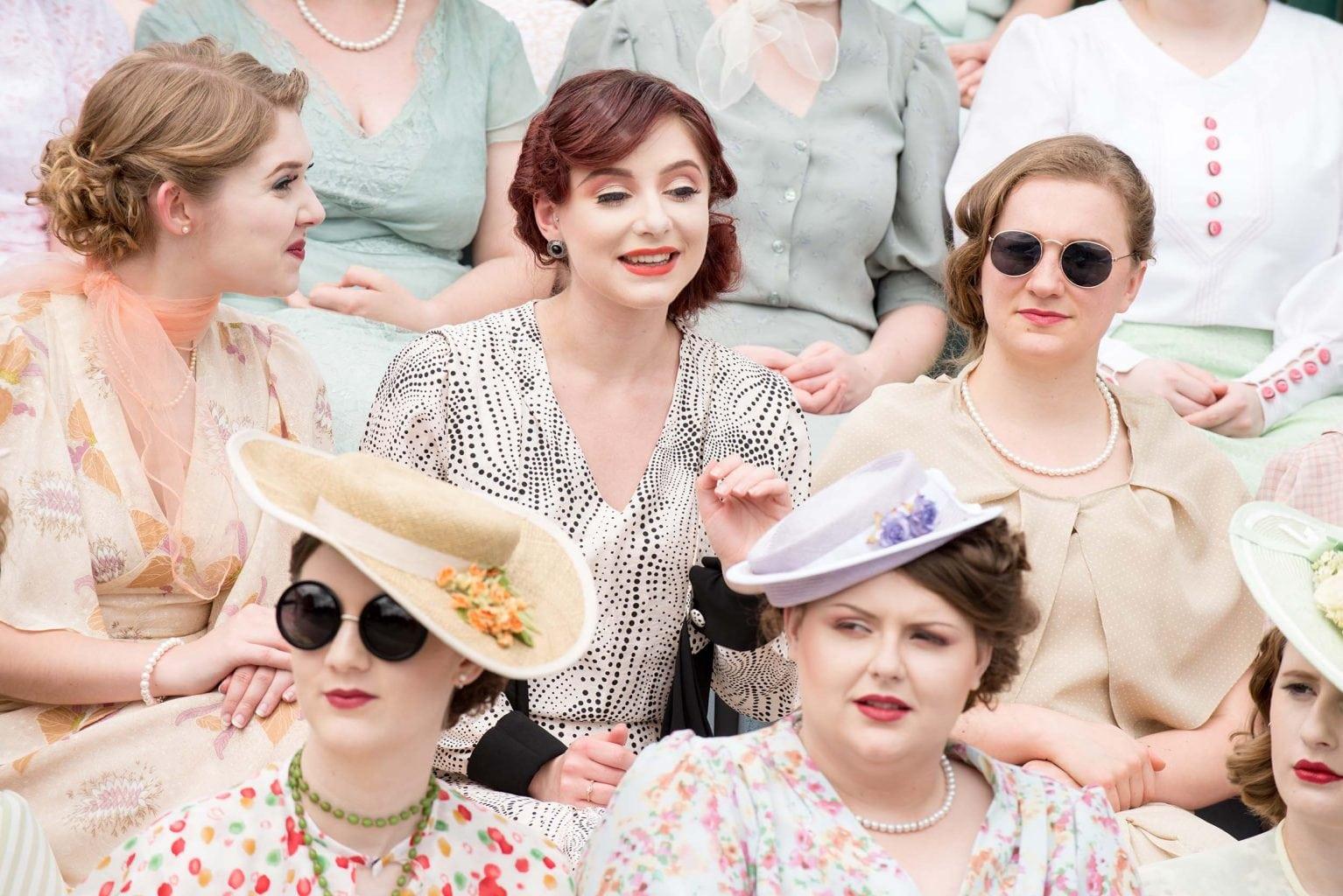 Actors wearing 1930s-inspired costumes for Wimbledon.