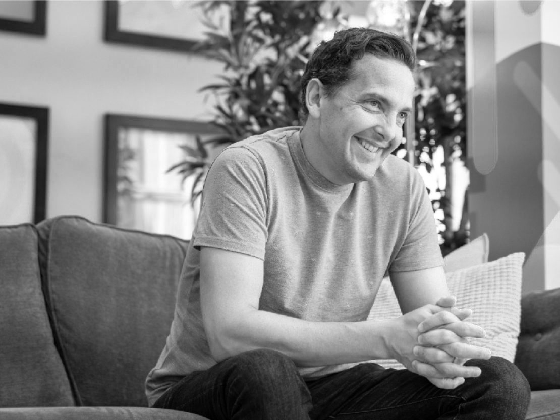 Black and white image of Rich Strachen from 3 Sided Cube
