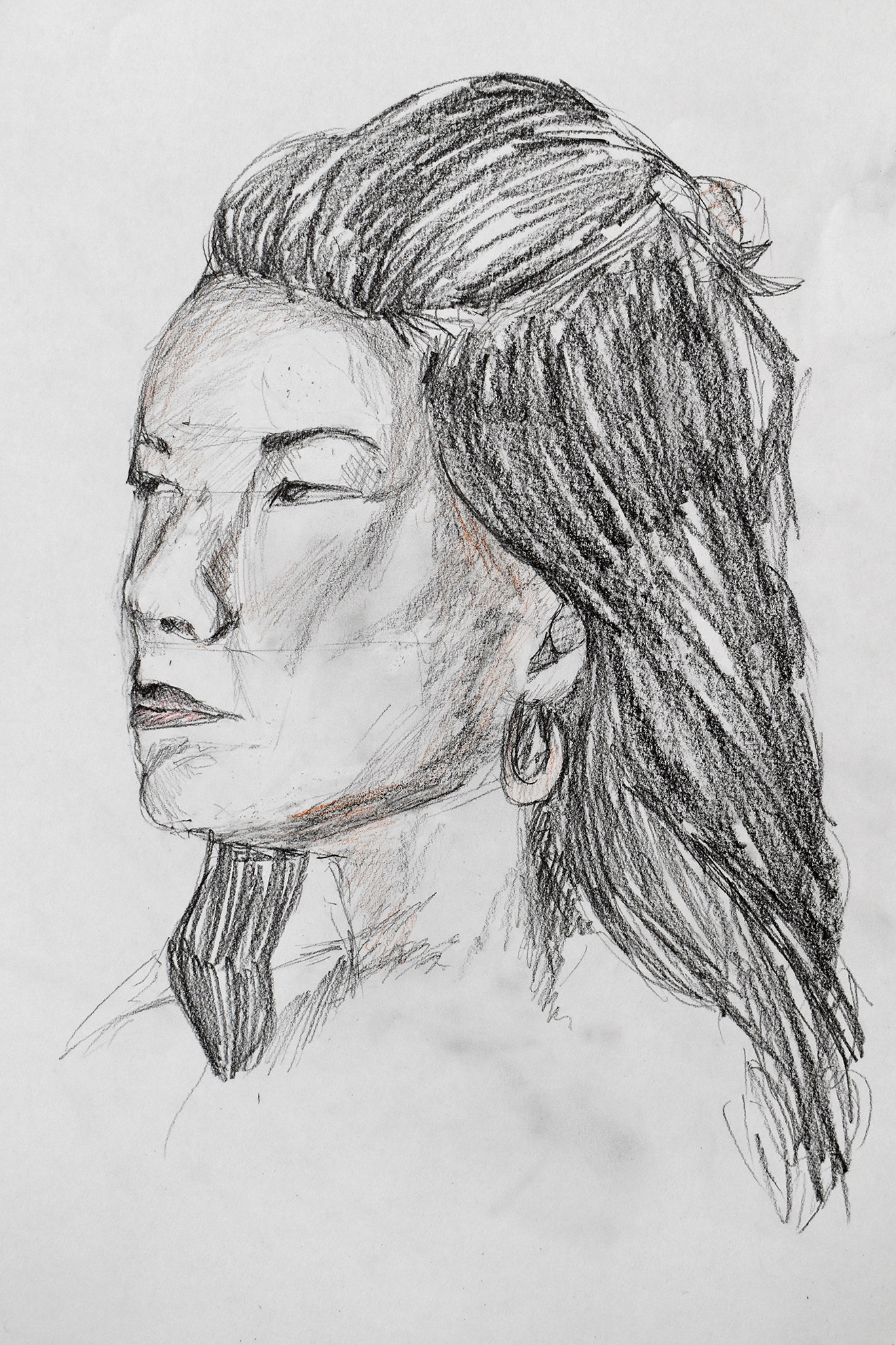 A pencil portrait drawing of a person