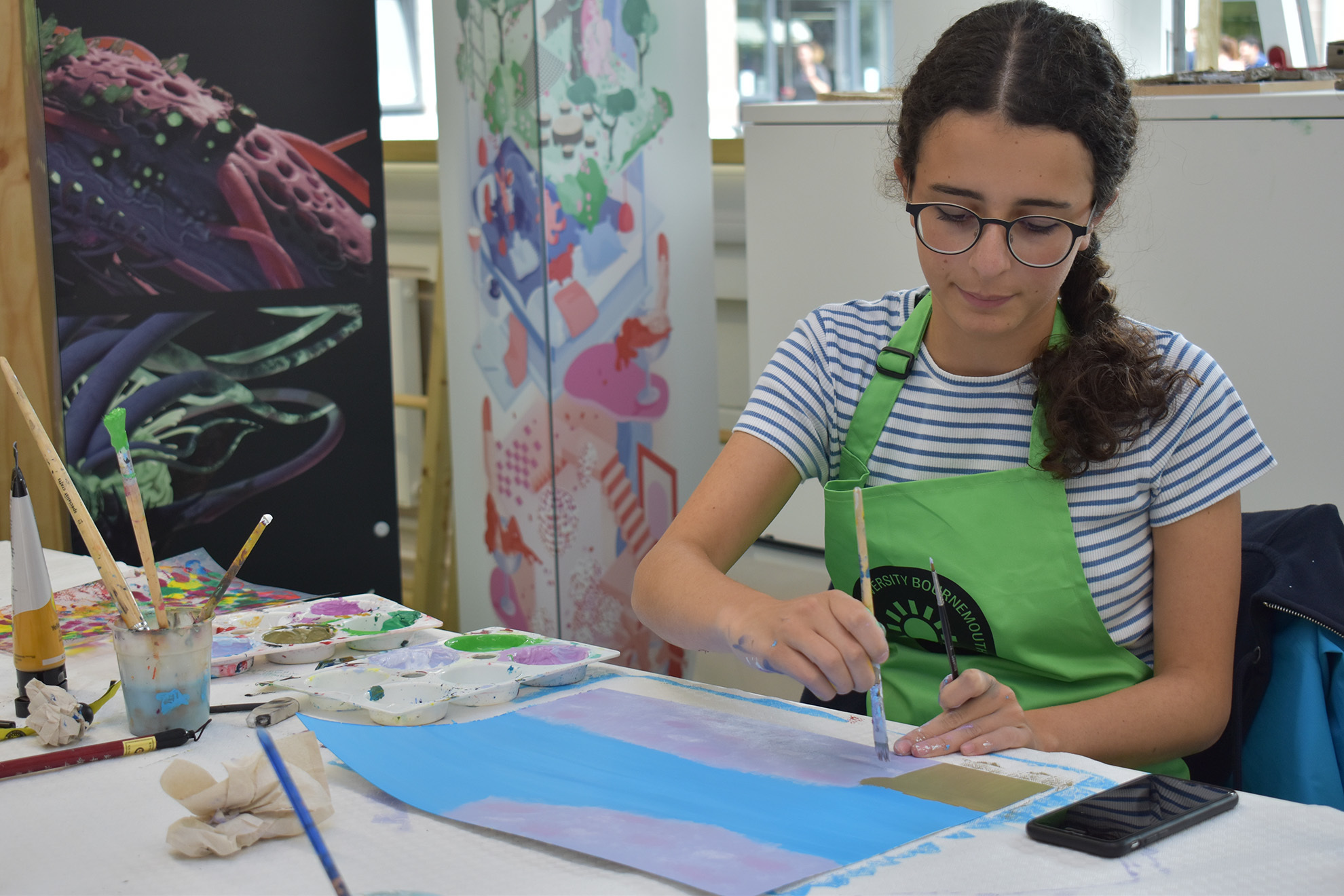 A student is painting