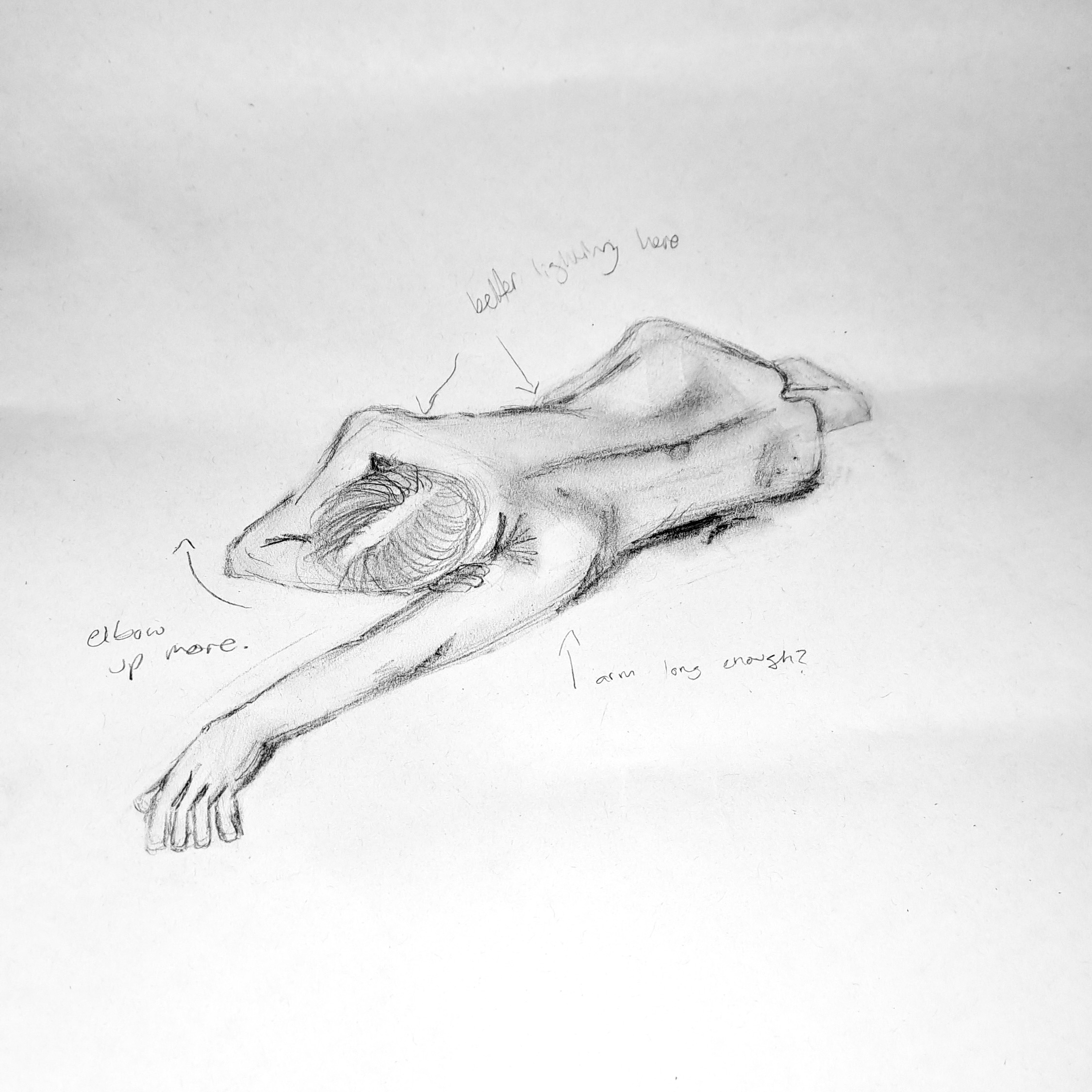 A pencil sketch shows a nude figure lying face down with one arm extended, surrounded by handwritten annotation notes on a white page.