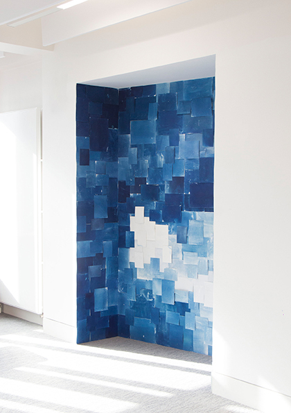 Blue paper covering a white alcove