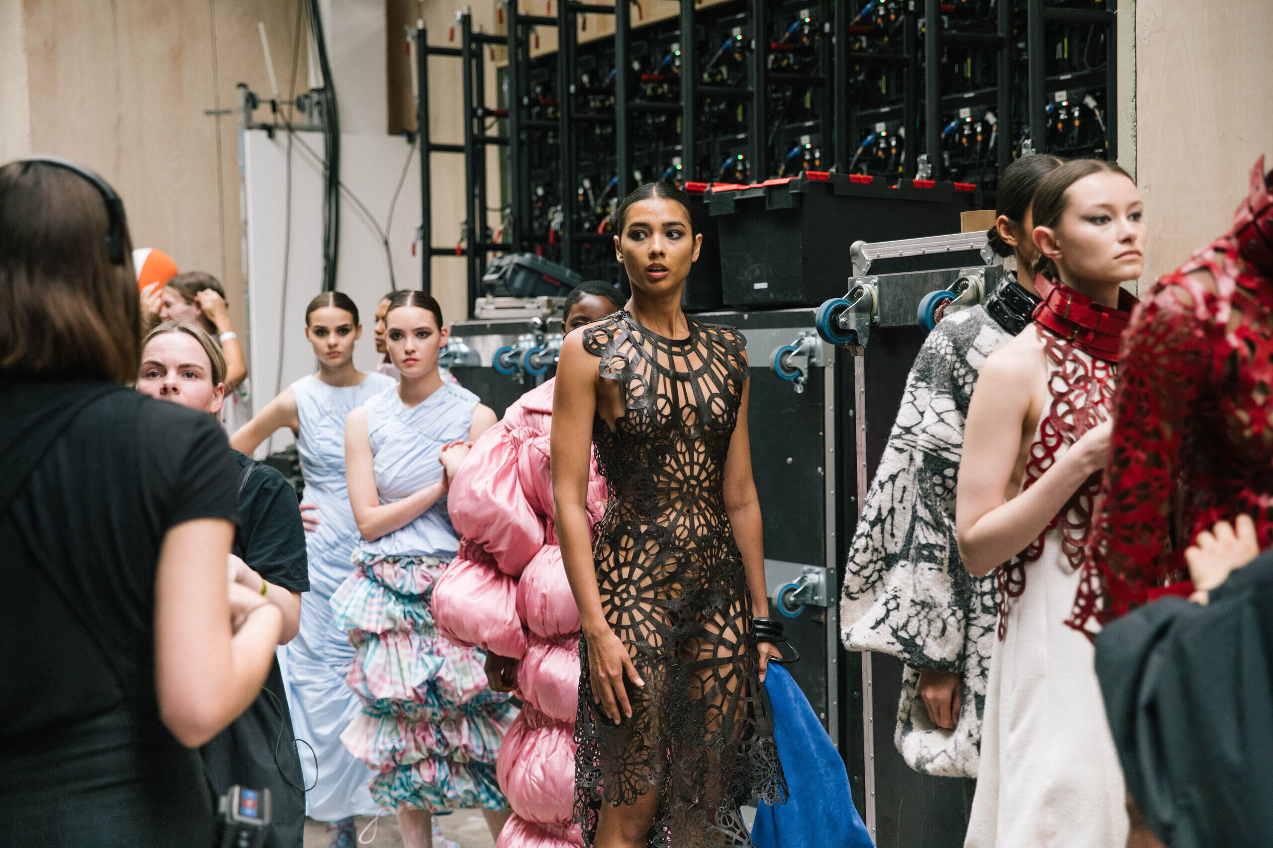 A group of fashion models lining up.