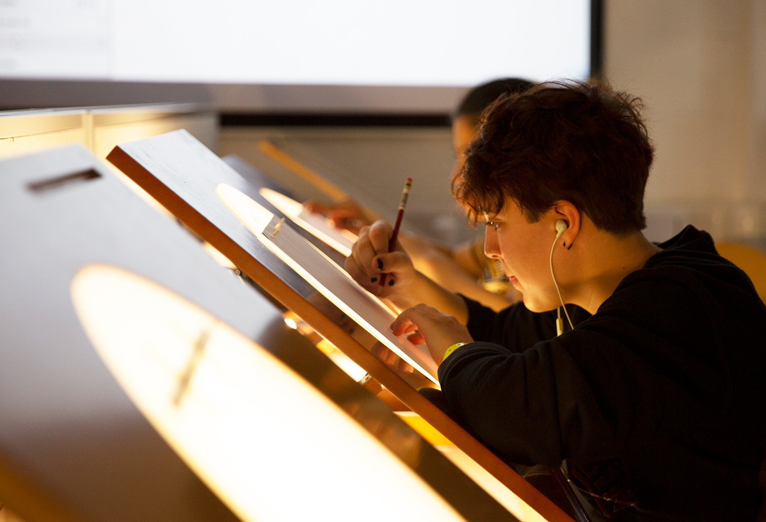 Student working at lightbox