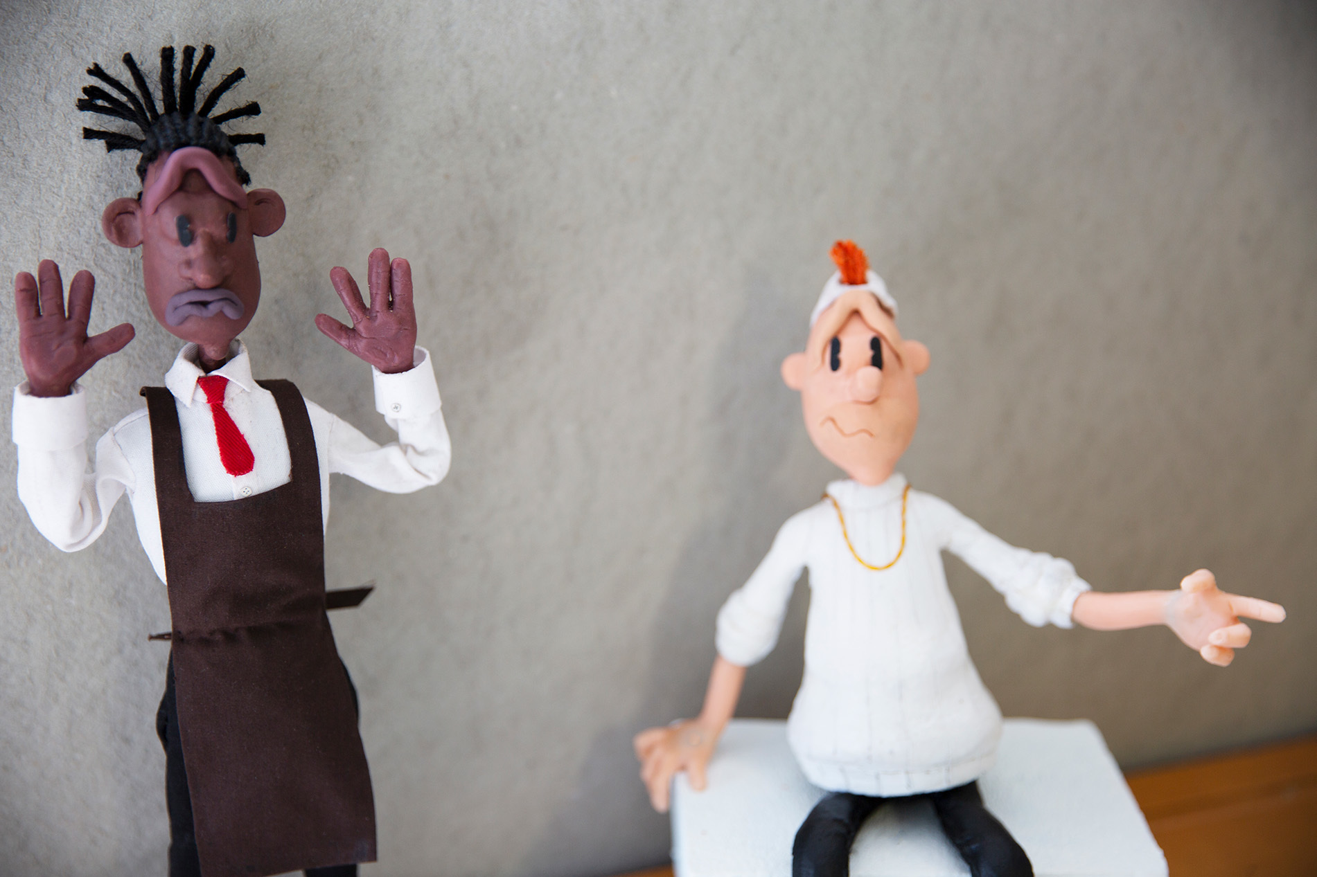 Clay models of two humans for stop motion