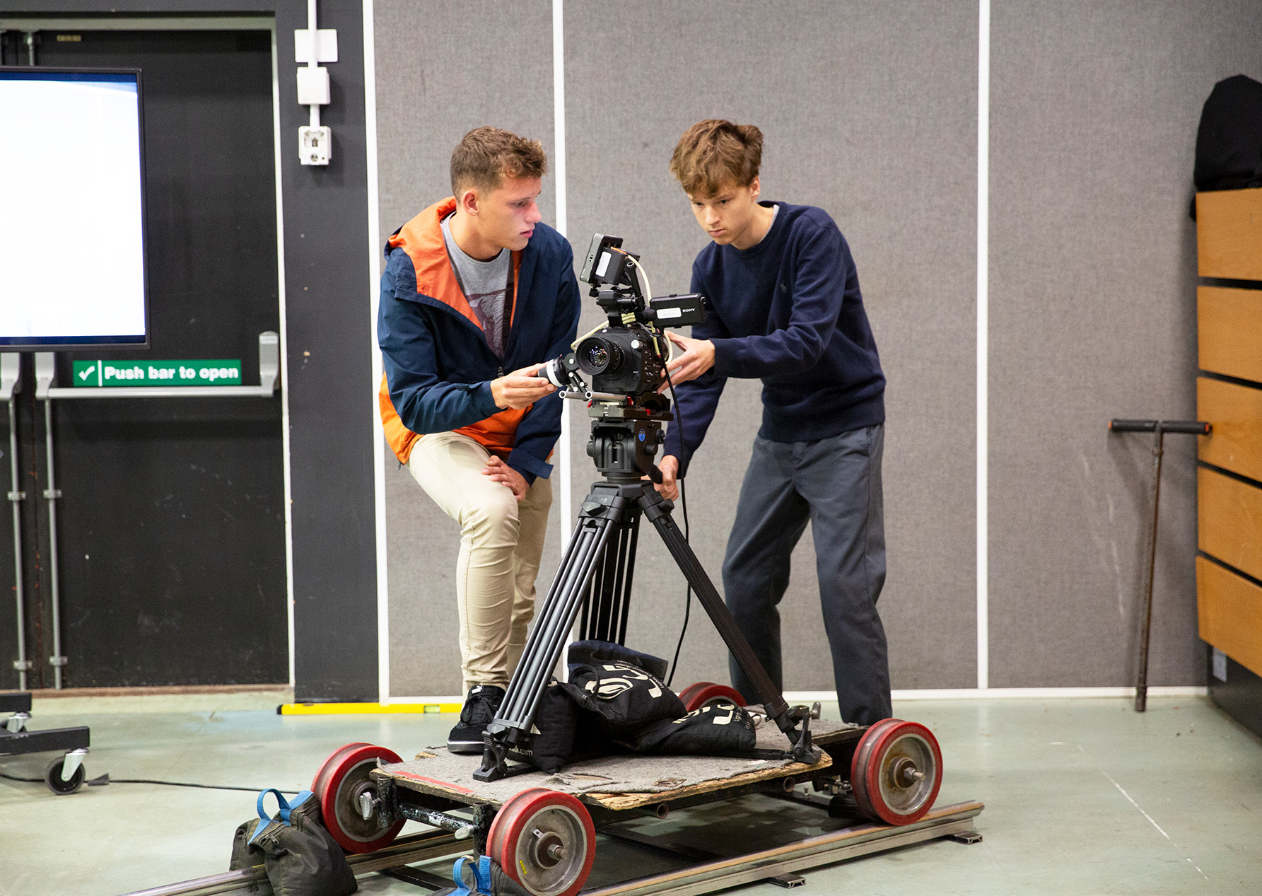 Students operating film camera