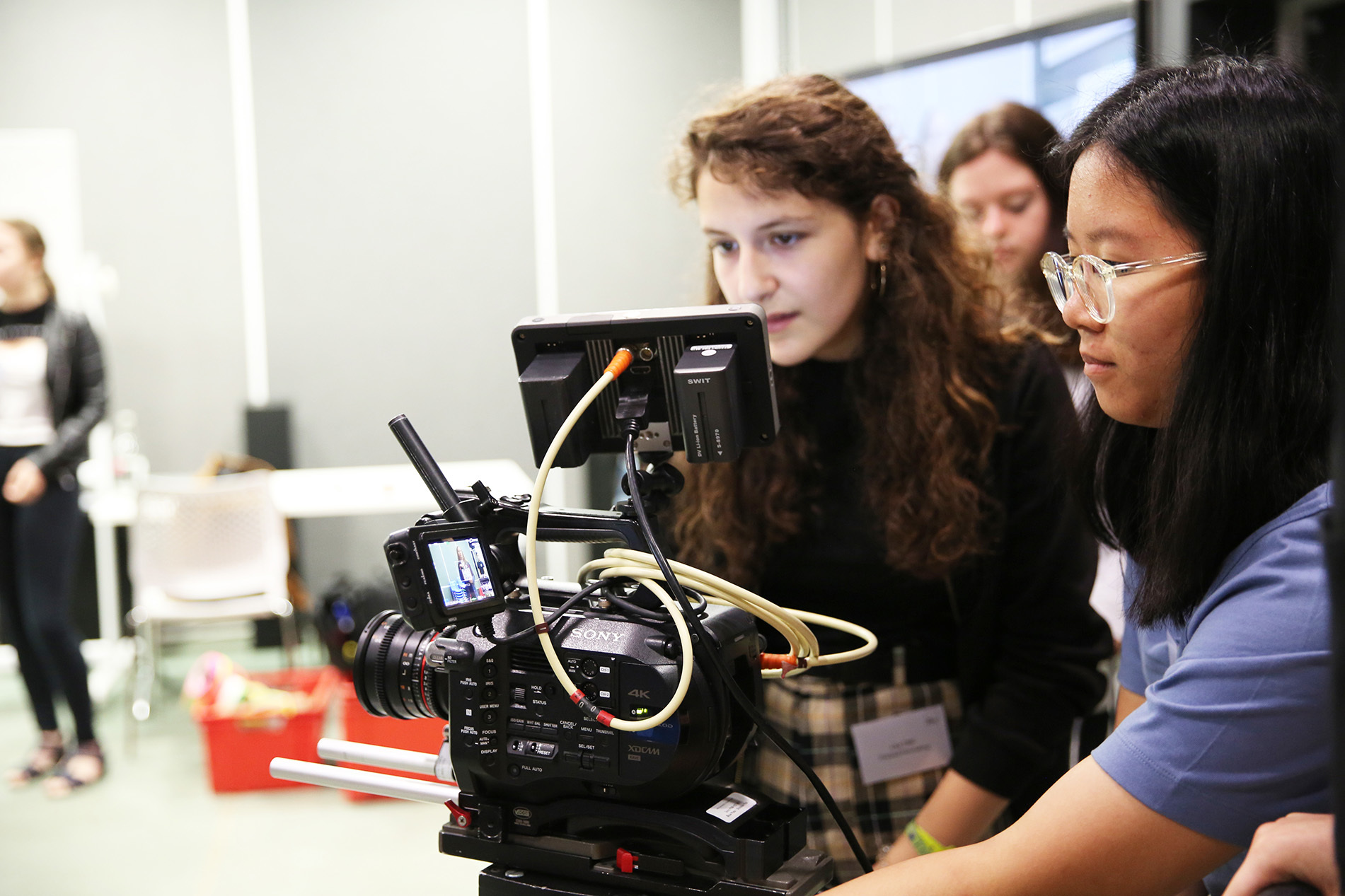 Students operating film camera