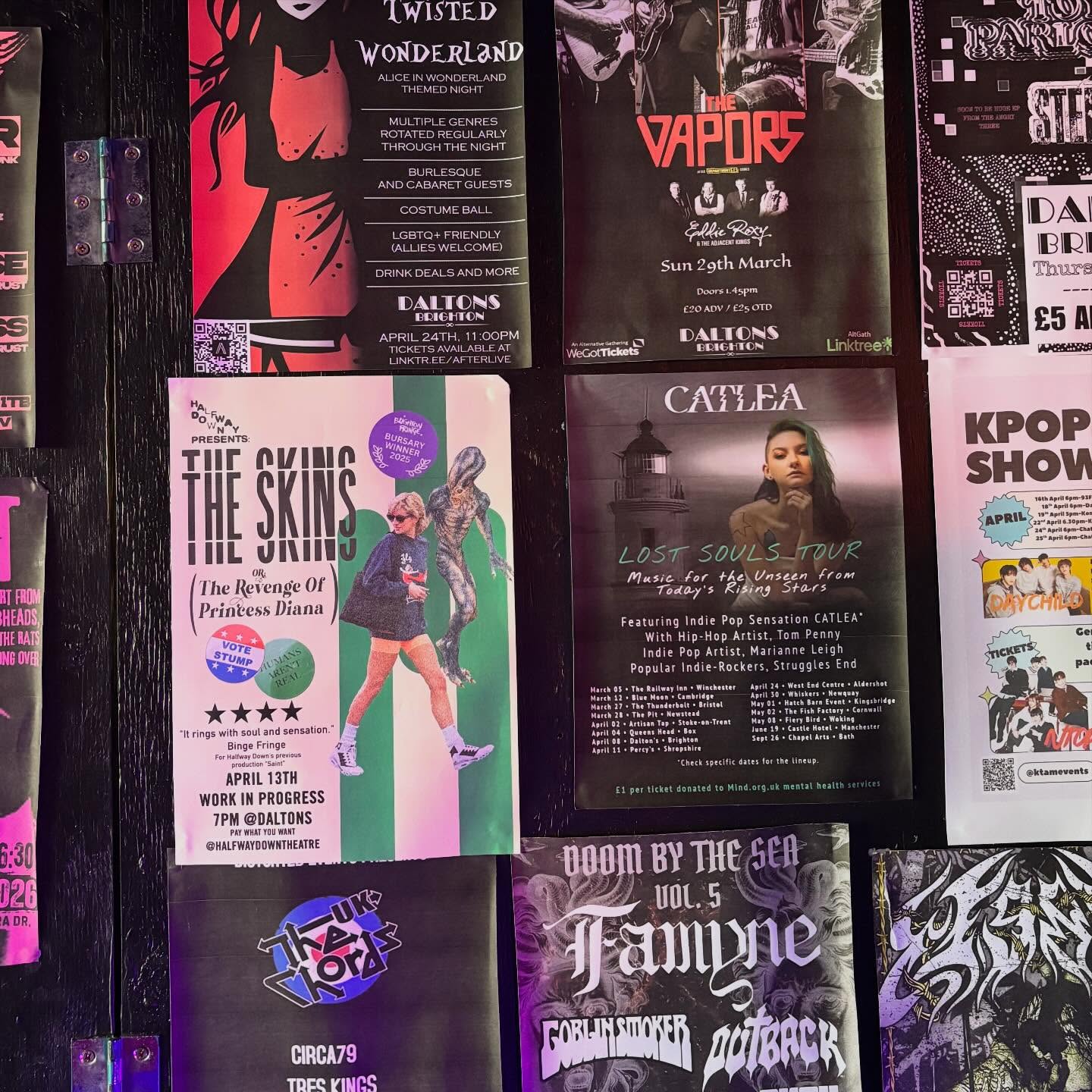 Poster for The Skins amongst others on a dark background.