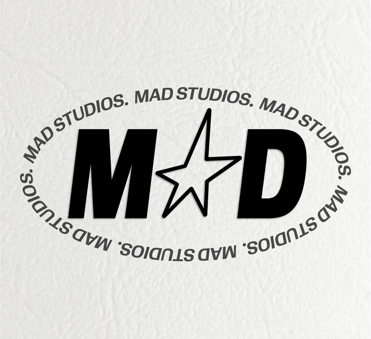 Logo for MAD STUDIOS.