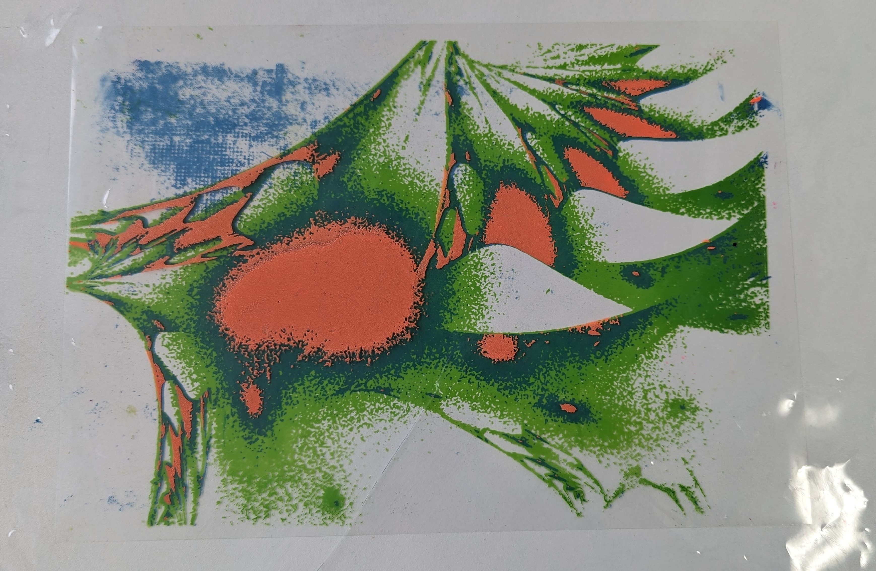Abstract image in green and orange, produced by hybrid cyanotype printing.