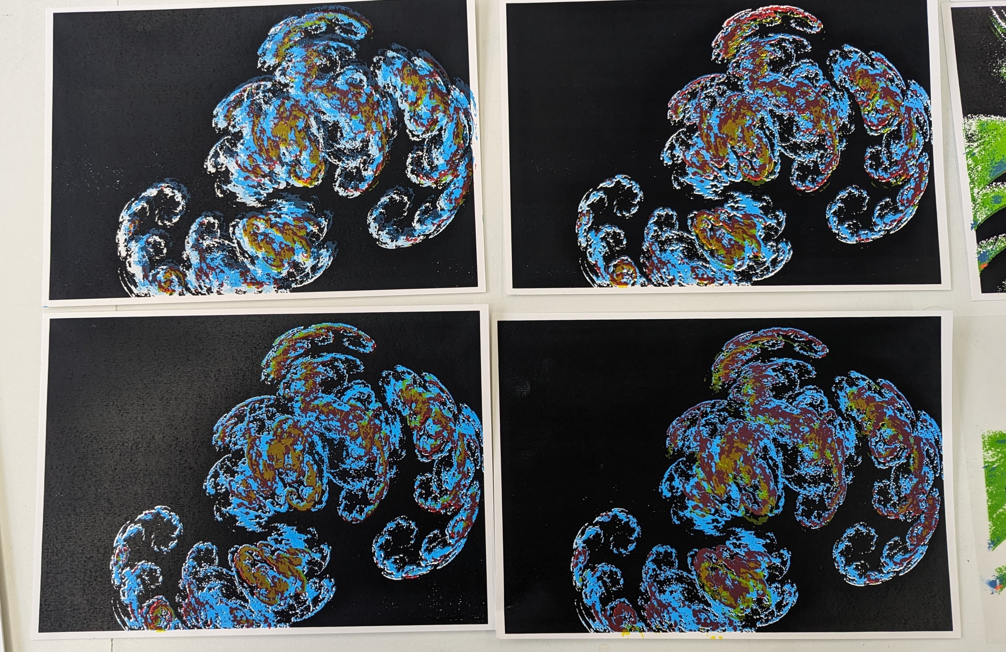 Four hybrid cyanotype printed abstract images on black backgrounds.