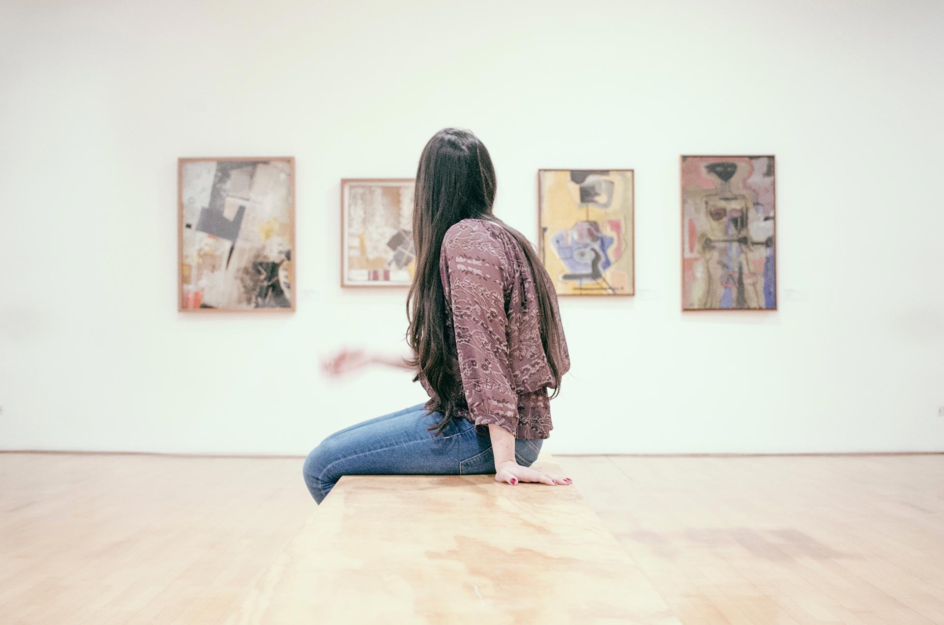 student sits in gallery