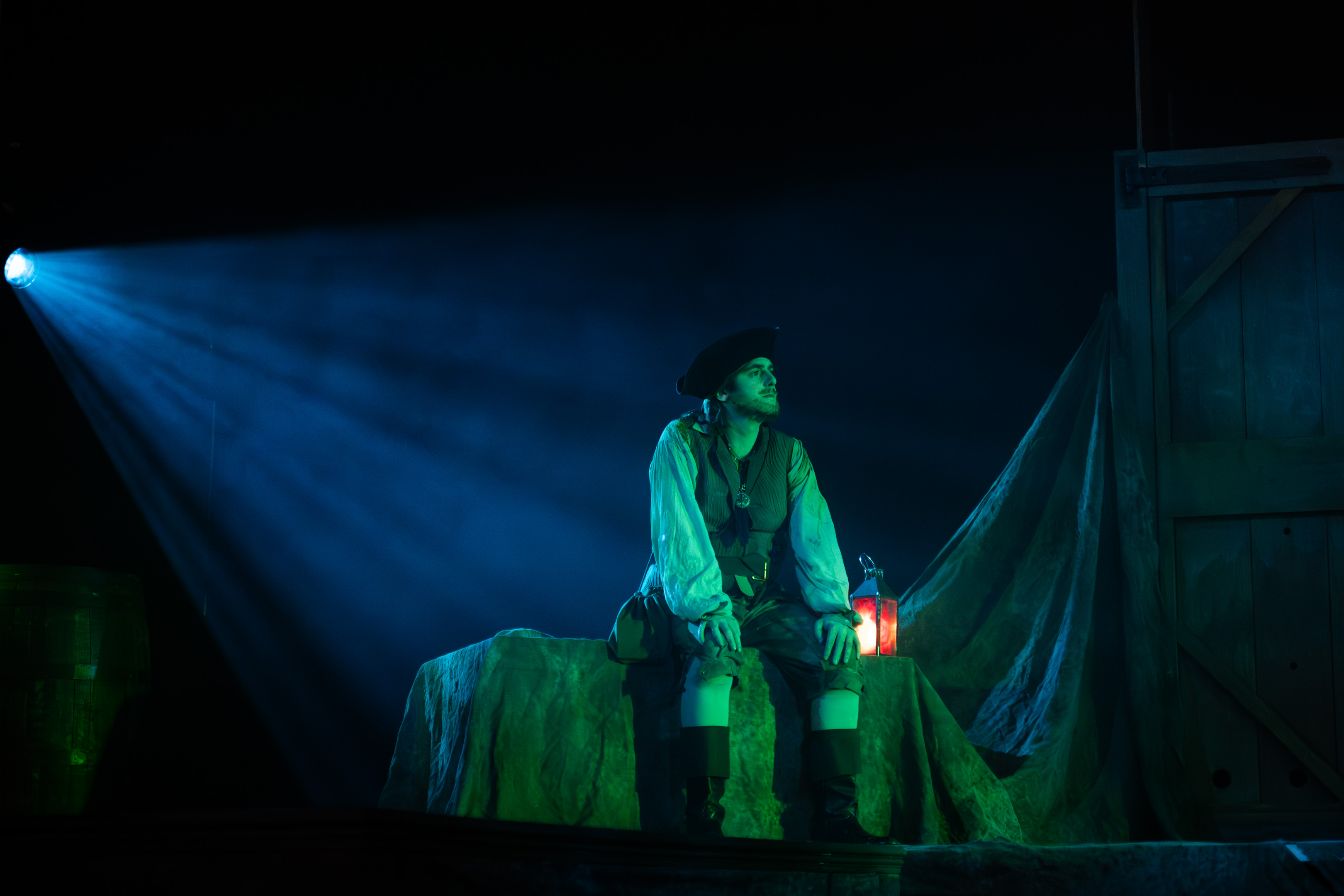 BA (Hons) Acting student in period costume as a smuggler on stage at the Palace Court Theatre, Bournemouth, in a performance of "Moonfleet".
