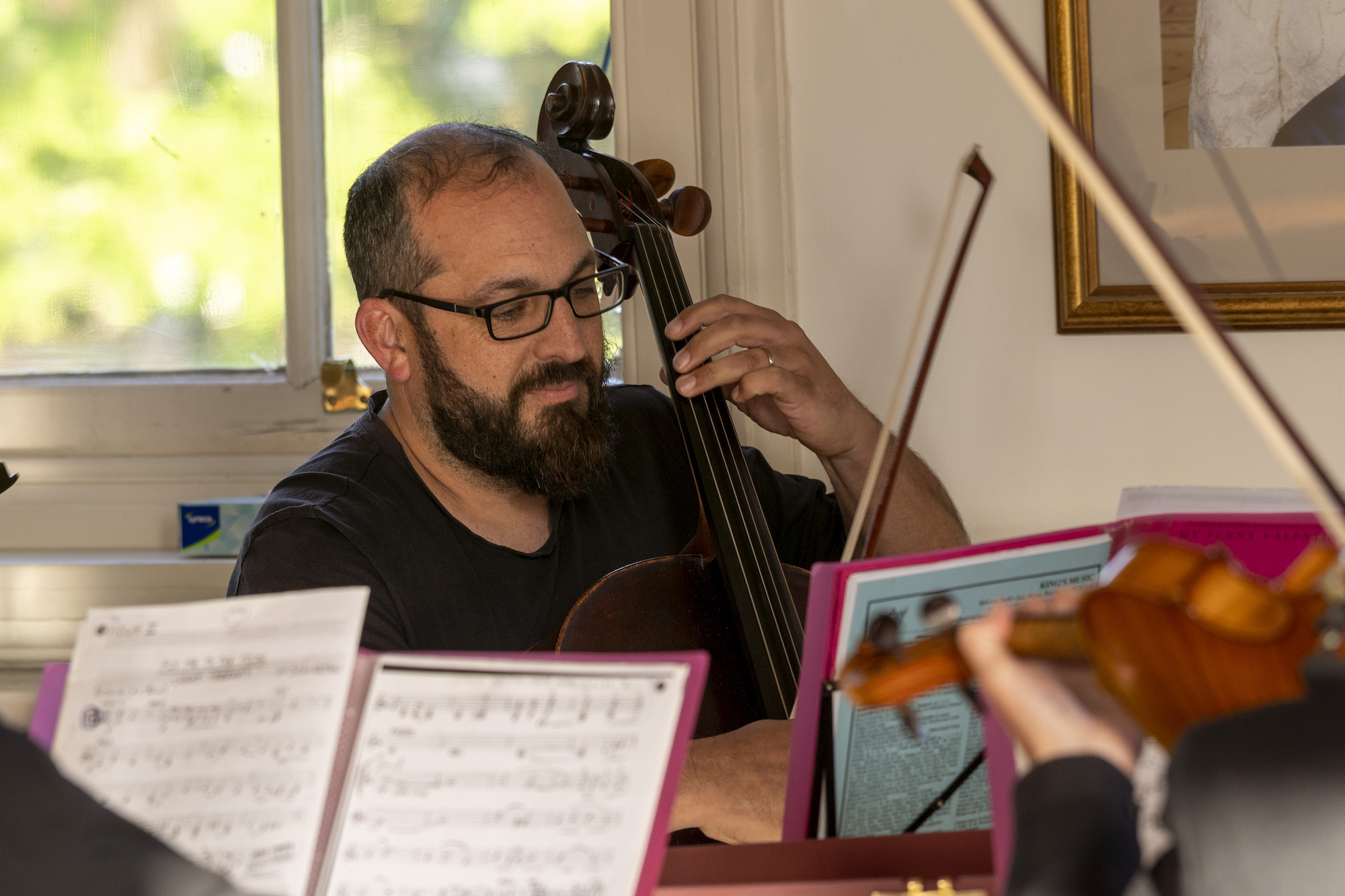 Man with Violine performing at the AUB Dance Guildhall Opera Purcell Dido and Aeneas
