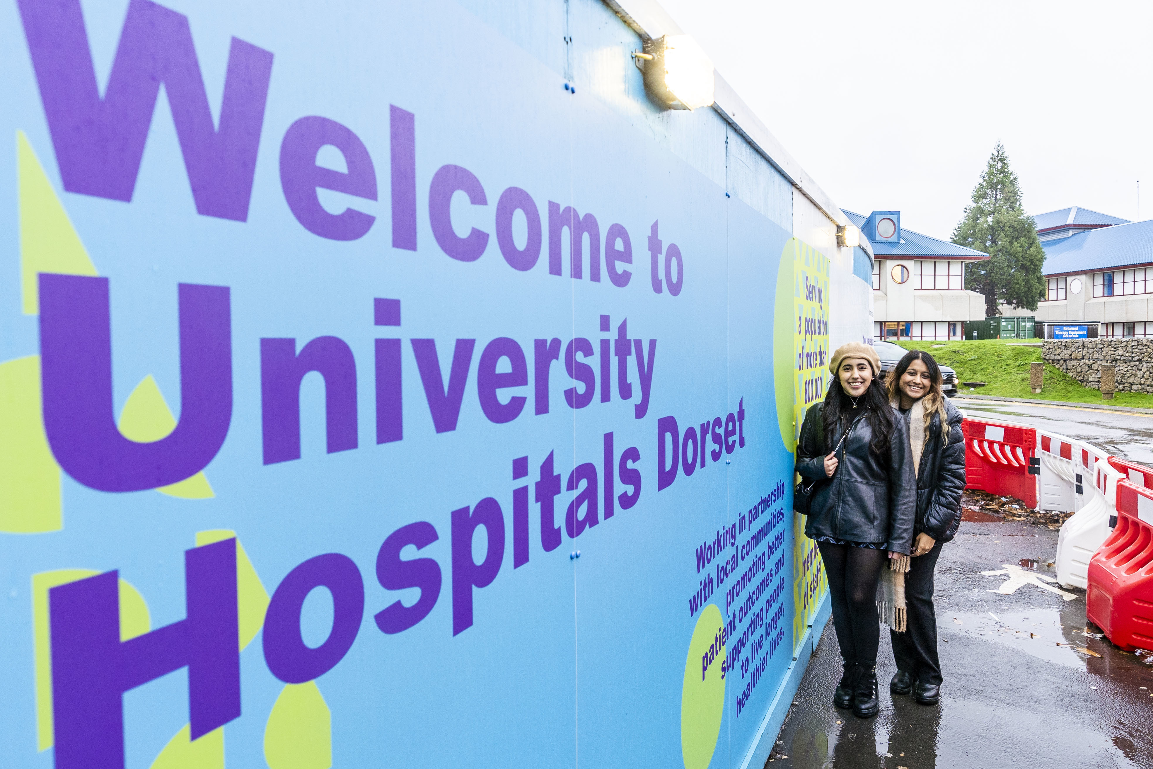 AUB IAD students Raquel and Dahnya visit their design work at Royal Bournemouth Hospital