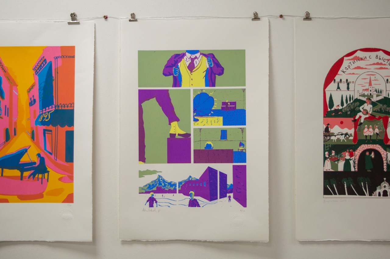 A series of colourful illustrations hung up