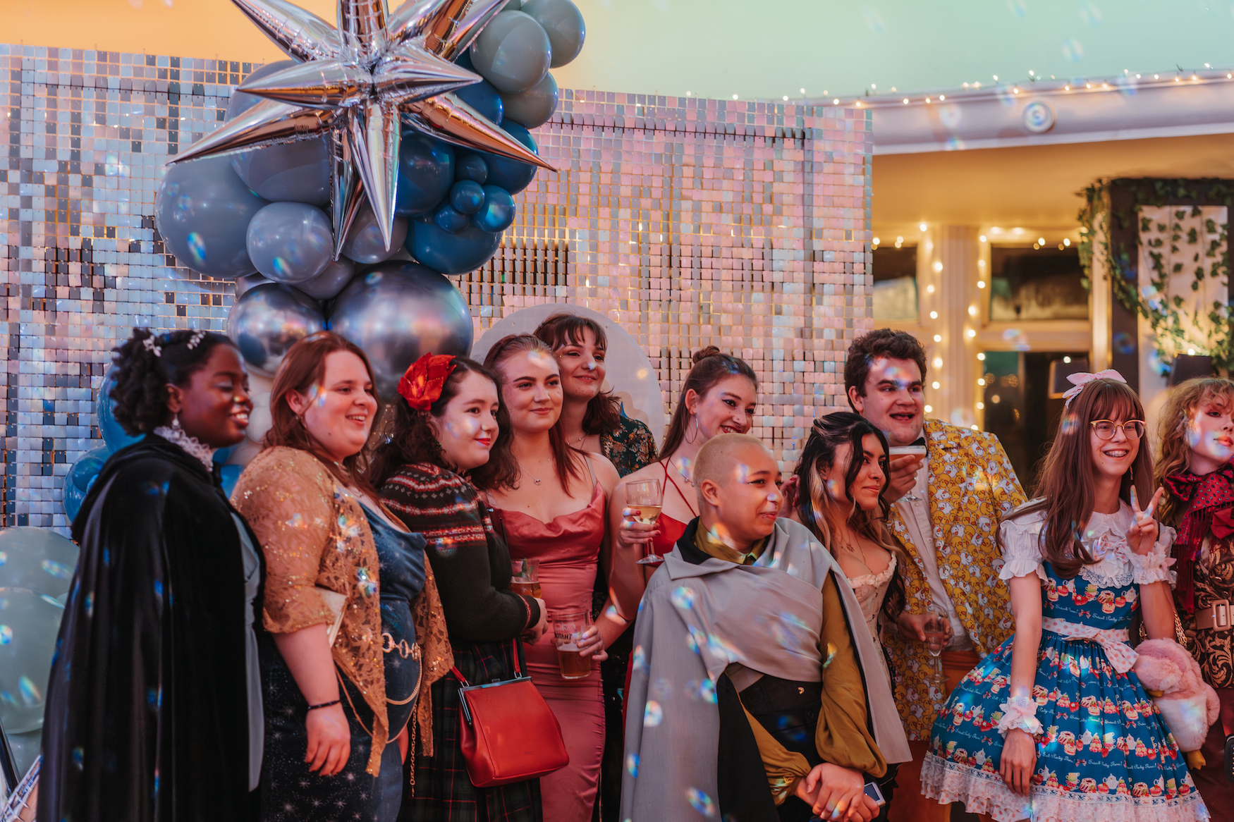 A group of AUB students pose for a photo at a Christmas party.