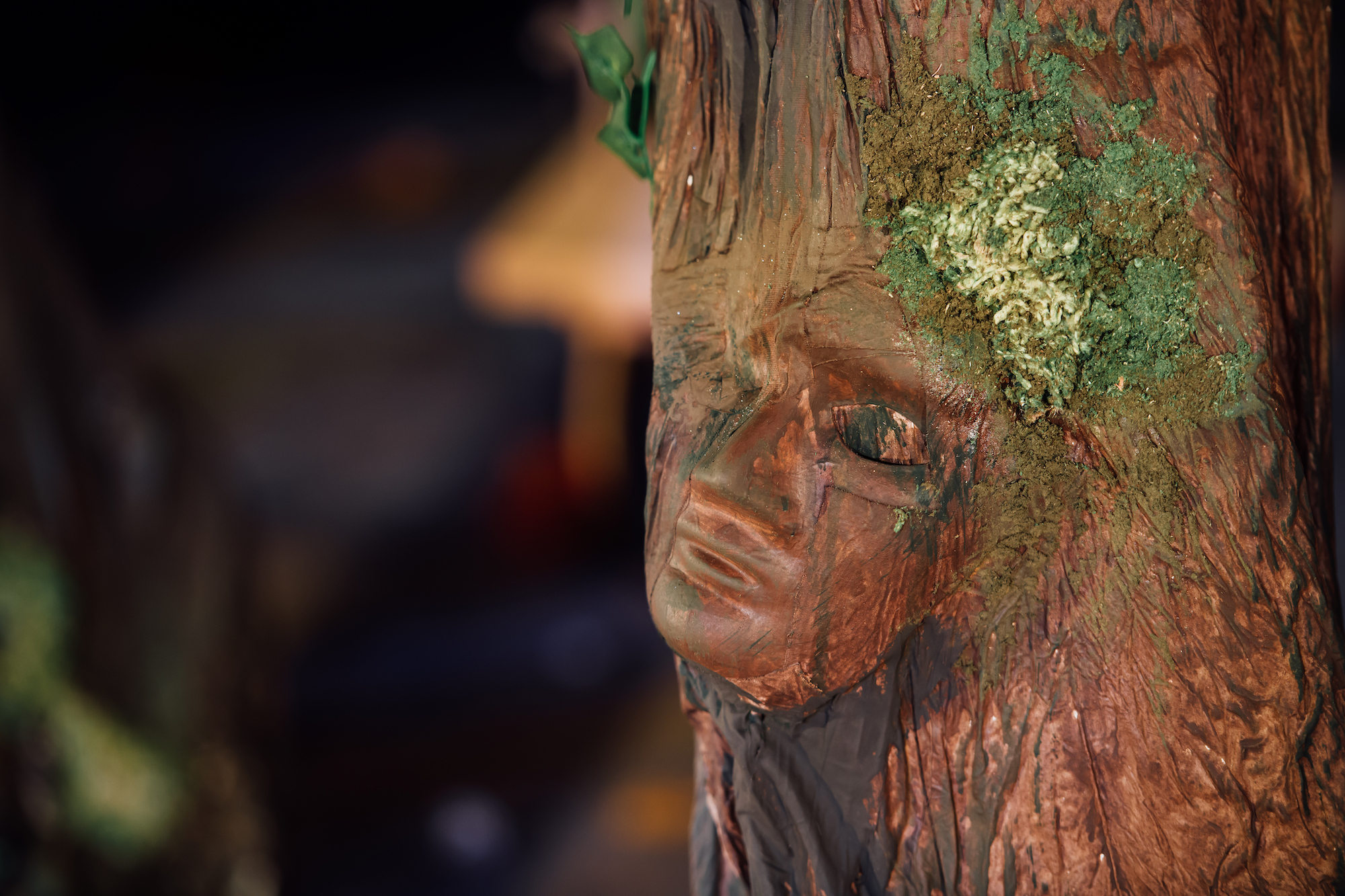 Set design for A Midsummer Night's Dream, tree with a face pushing out from it.