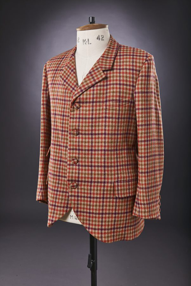 19th Century patterned jacket on display on a mannequin.
